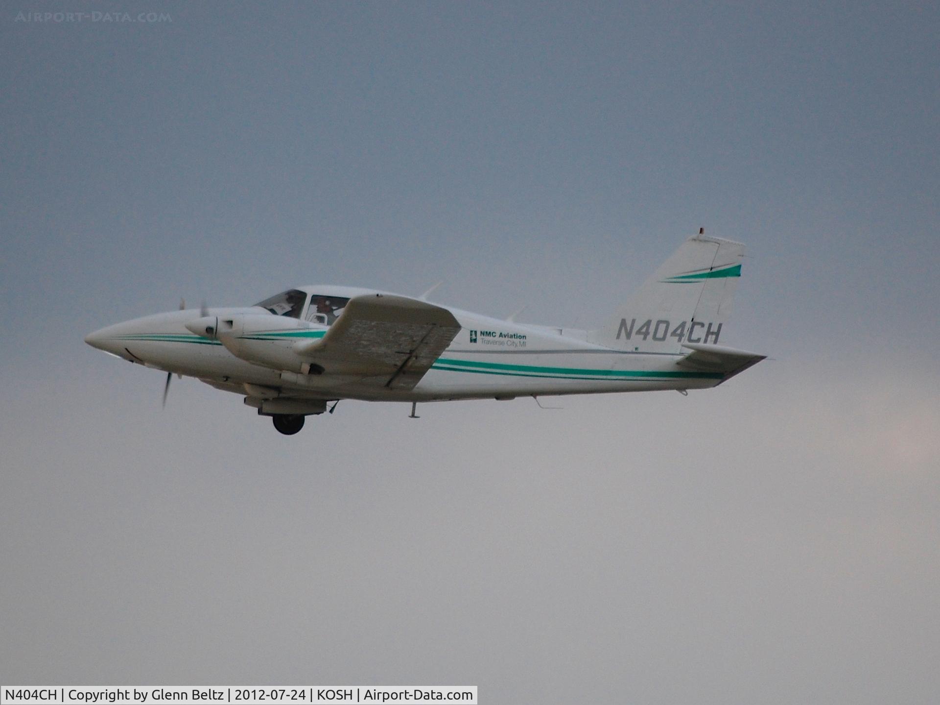 N404CH, 1976 Piper PA-23-250 Aztec C/N 27-7654191, Departing EAA Airventure/Oshkosh on 24 July 2012.