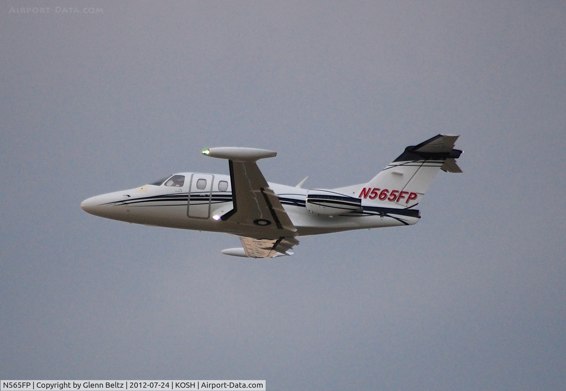 N565FP, 2007 Eclipse Aviation Corp EA500 C/N 000081, Departing EAA Airventure/Oshkosh on 24 July 2012.