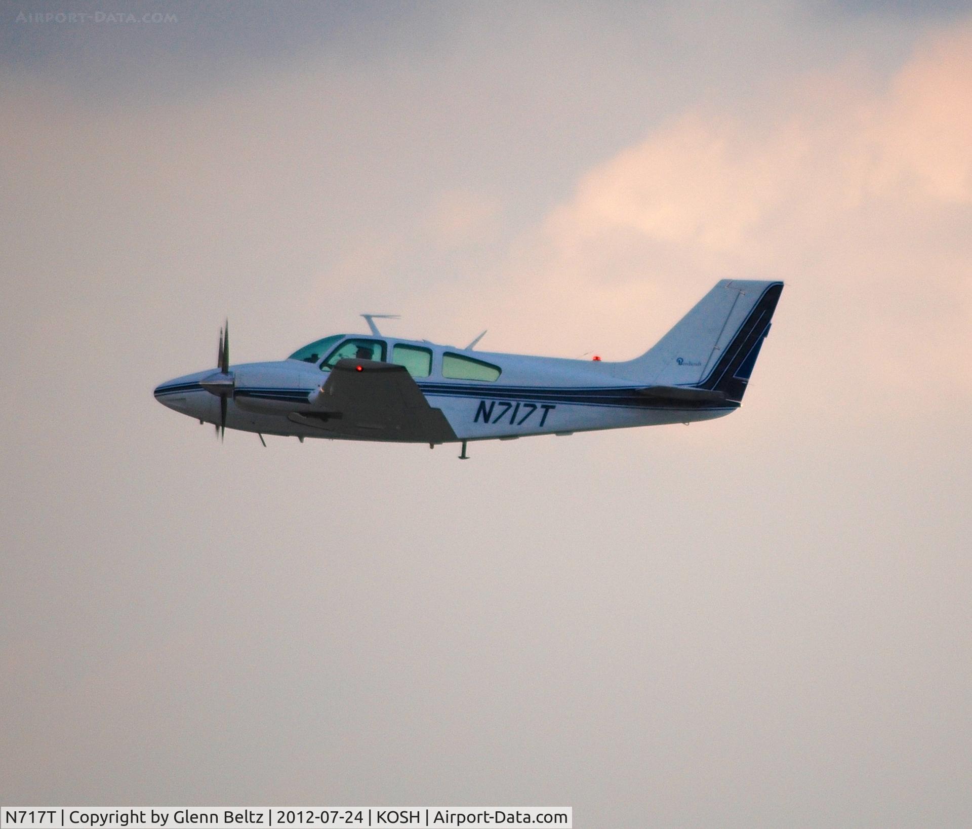 N717T, 1962 Beech 95-A55 Baron C/N TC-321, Departing EAA Airventure/Oshkosh on 24 July 2012.
