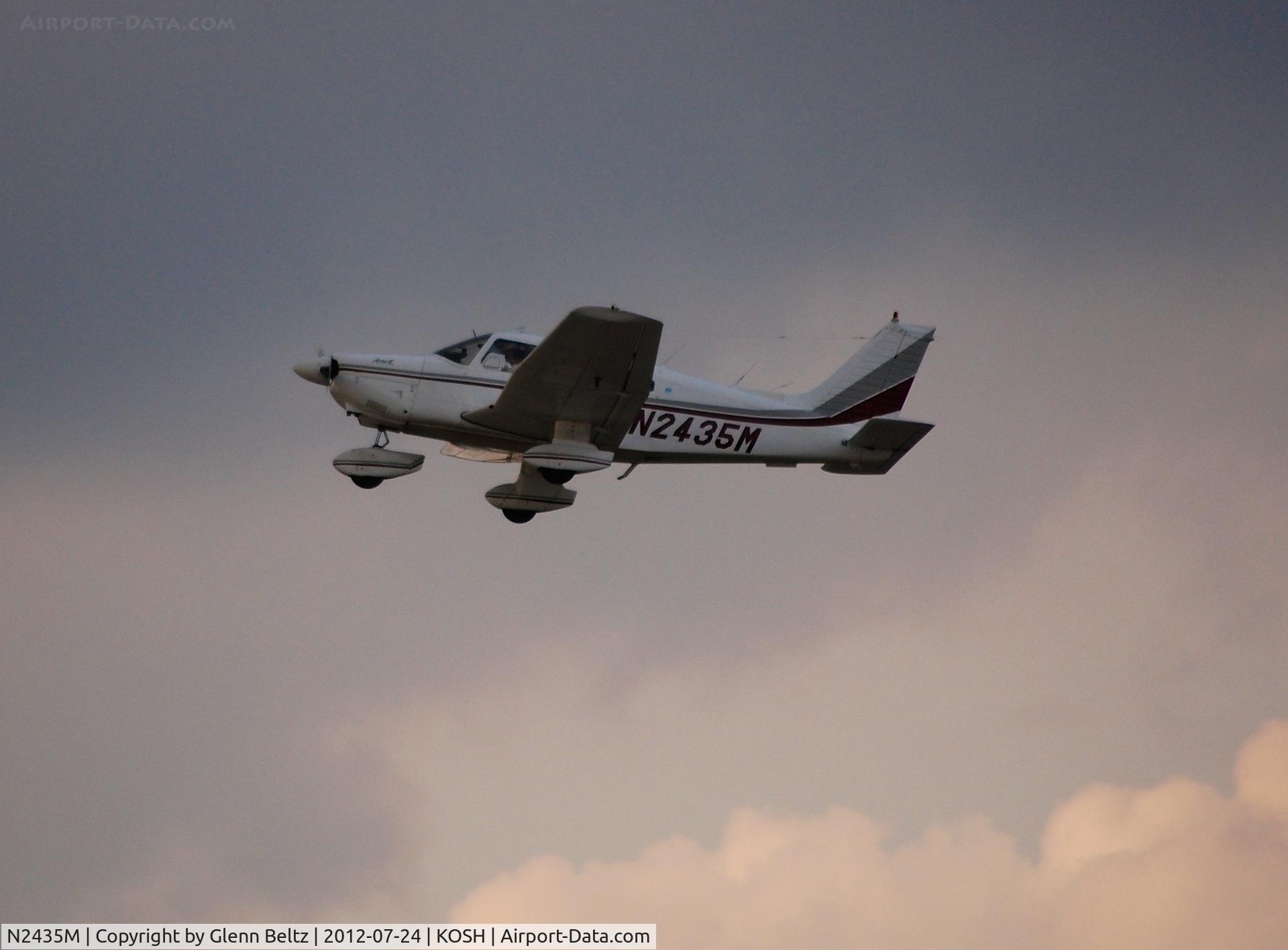 N2435M, 1977 Piper PA-28-181 C/N 28-7890253, Departing EAA Airventure/Oshkosh on 24 July 2012.