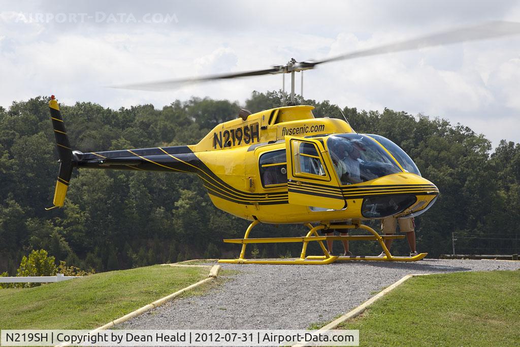 N219SH, 1974 Bell 206B Jetranger II C/N 1532, 1974 Bell JetRanger II N219SH readies to take a group of people up for a sightseeing trip. Operated by Scenic Helicopter Tours in Seviereville, TN.