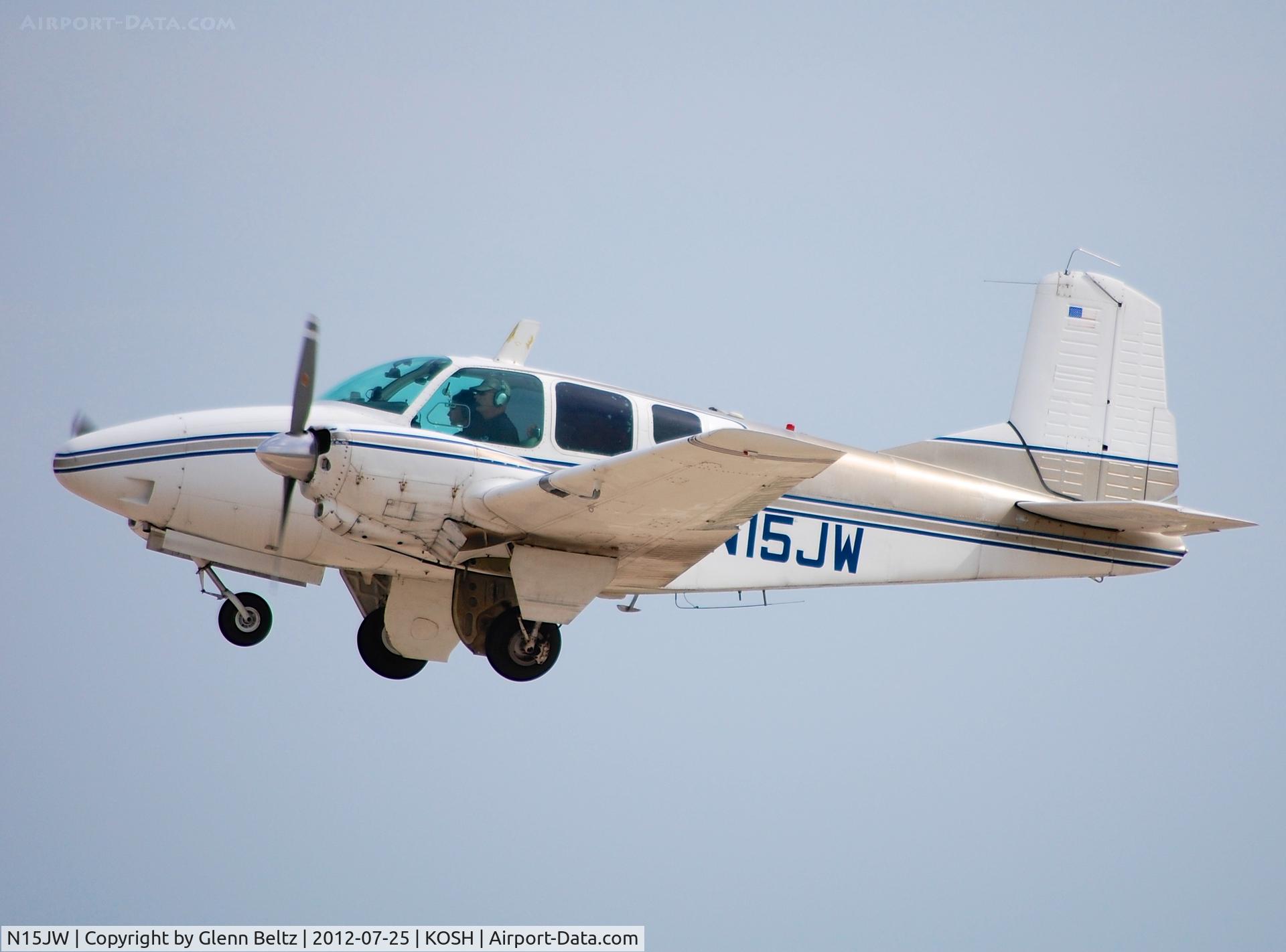 N15JW, 1959 Beech 95 Travel Air C/N TD-225, Departing EAA Airventure/Oshkosh on 25 July 2012.