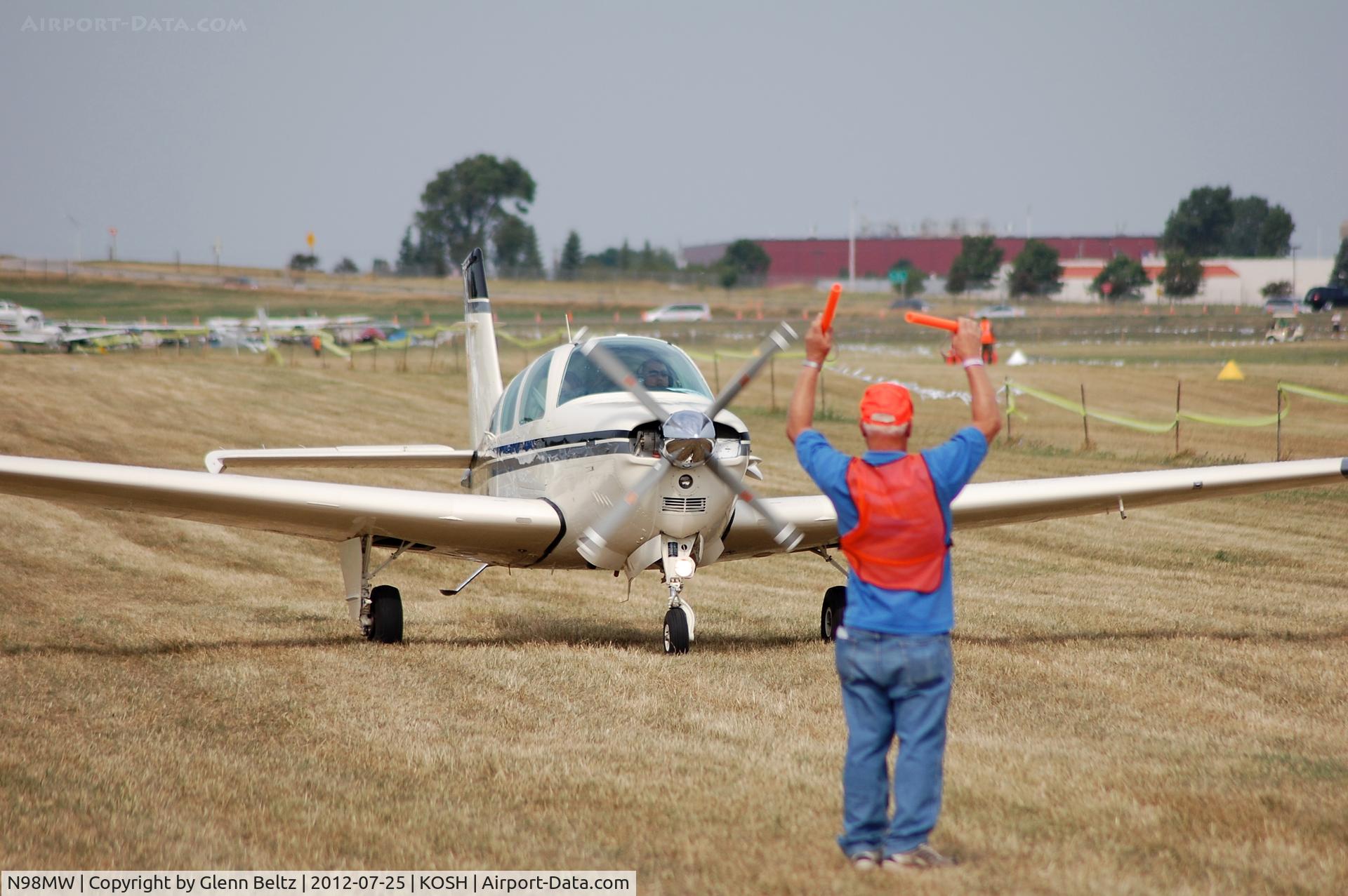 N98MW, 1988 Beech F33A Bonanza C/N CE-1228, Taxiing out for departure at Oshkosh on 25 July 2012.
