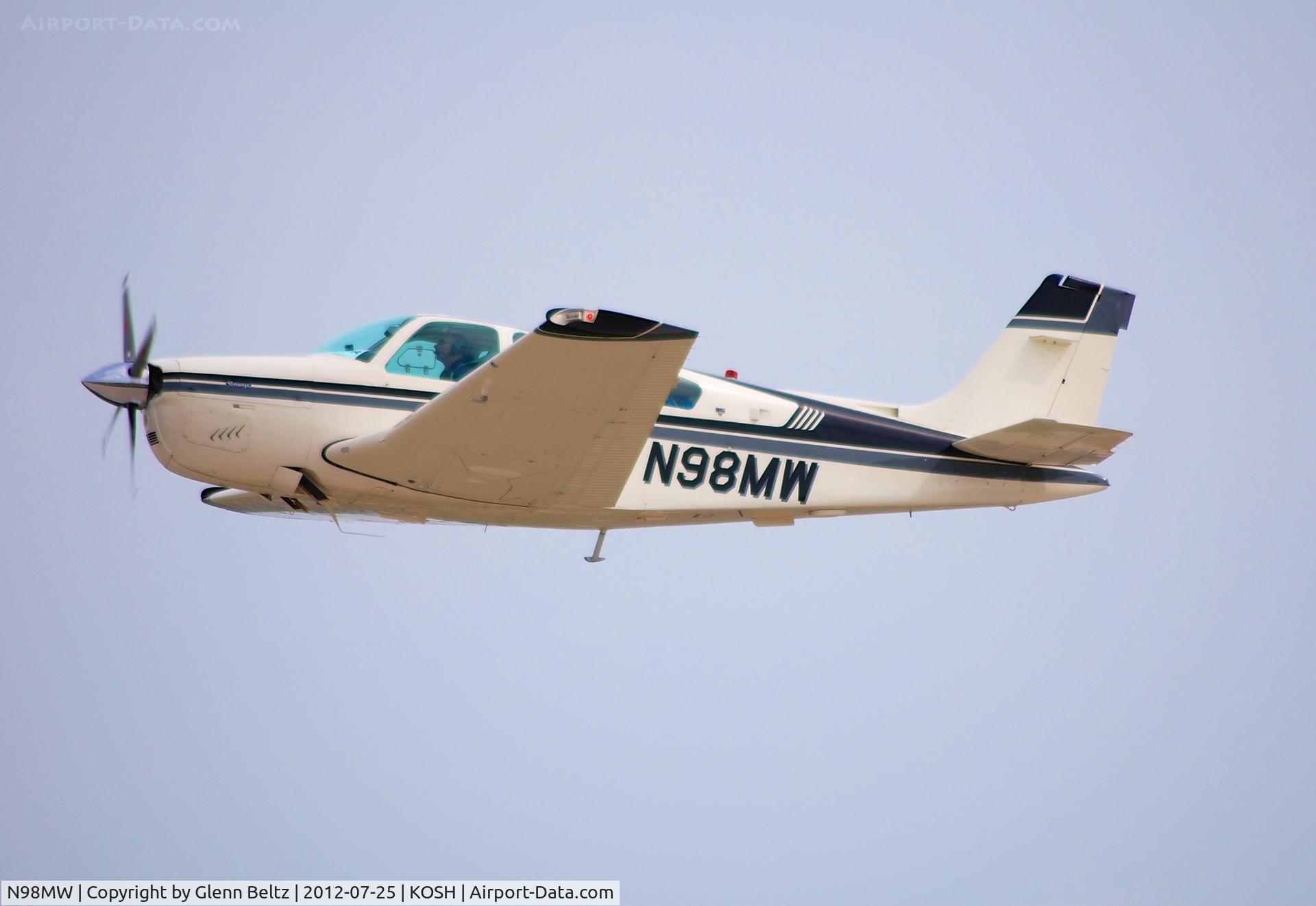 N98MW, 1988 Beech F33A Bonanza C/N CE-1228, Departing EAA Airventure/Oshkosh on 25 July 2012.
