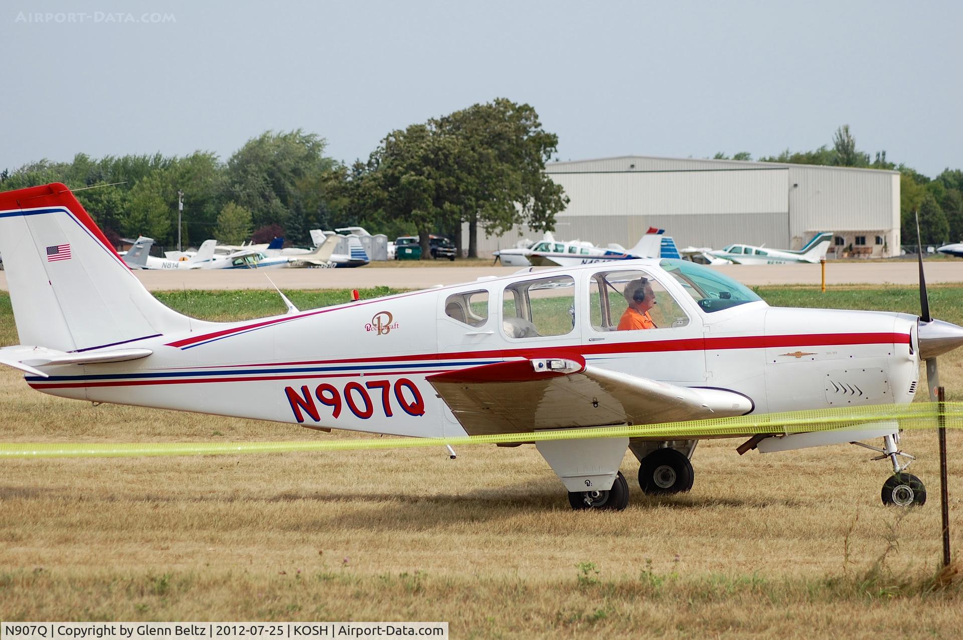 N907Q, 1962 Beech 35-A33 Debonair C/N CD-374, Taxiing at Oshkosh on 25 July 2012.