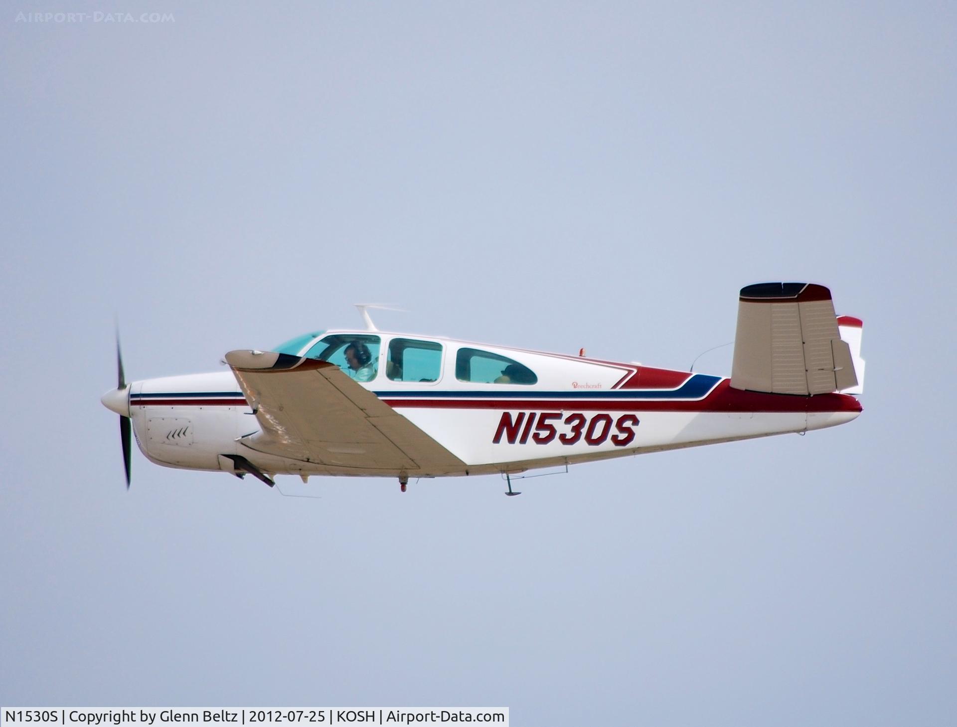 N1530S, 1962 Beech P35 Bonanza C/N D-6973, Departing EAA Airventure/Oshkosh on 25 July 2012.