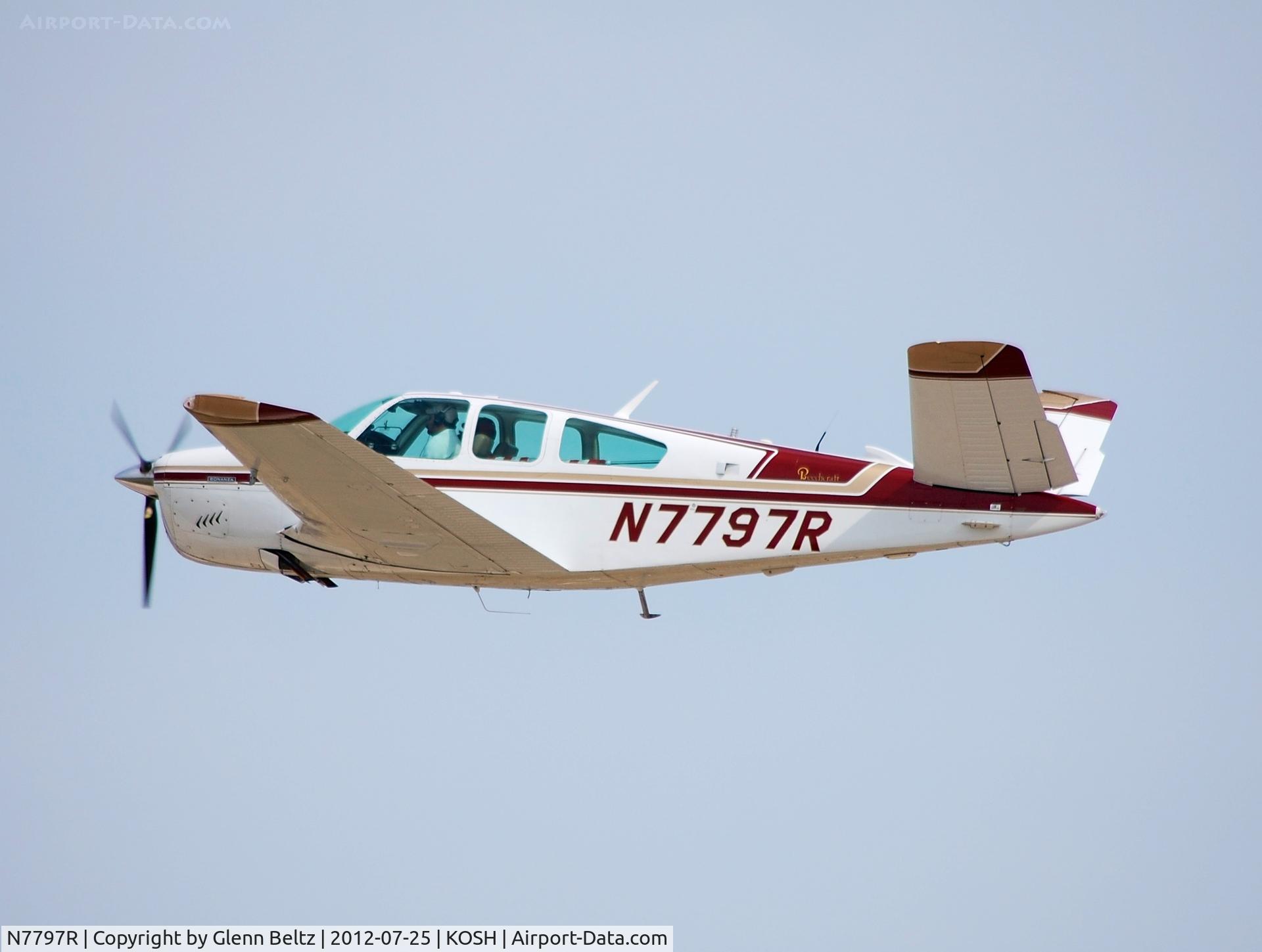 N7797R, 1968 Beech V35A Bonanza C/N D-8890, Departing EAA Airventure/Oshkosh on 25 July 2012.
