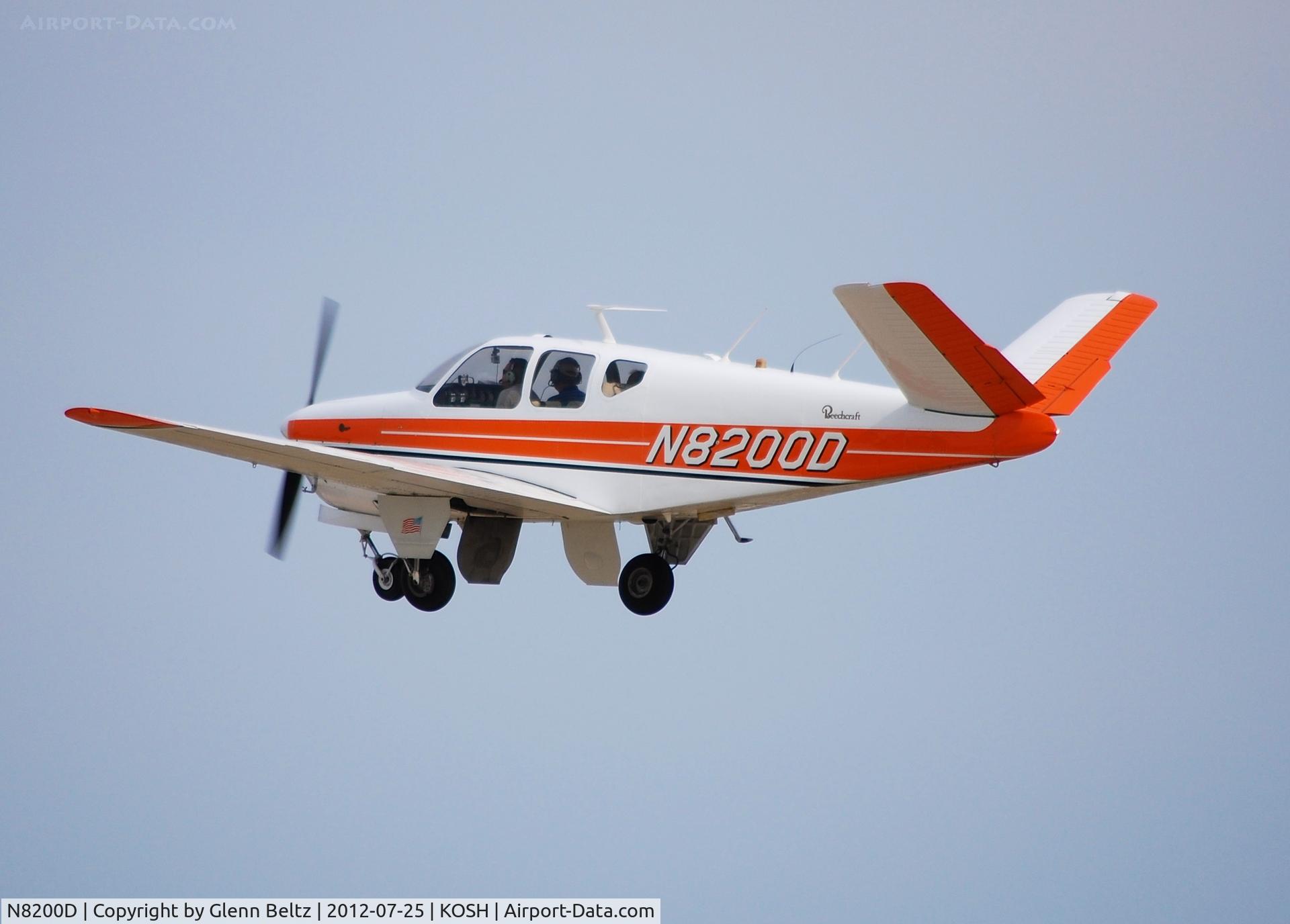N8200D, 1957 Beech H35 Bonanza C/N D-5293, Departing EAA Airventure/Oshkosh on 25 July 2012.