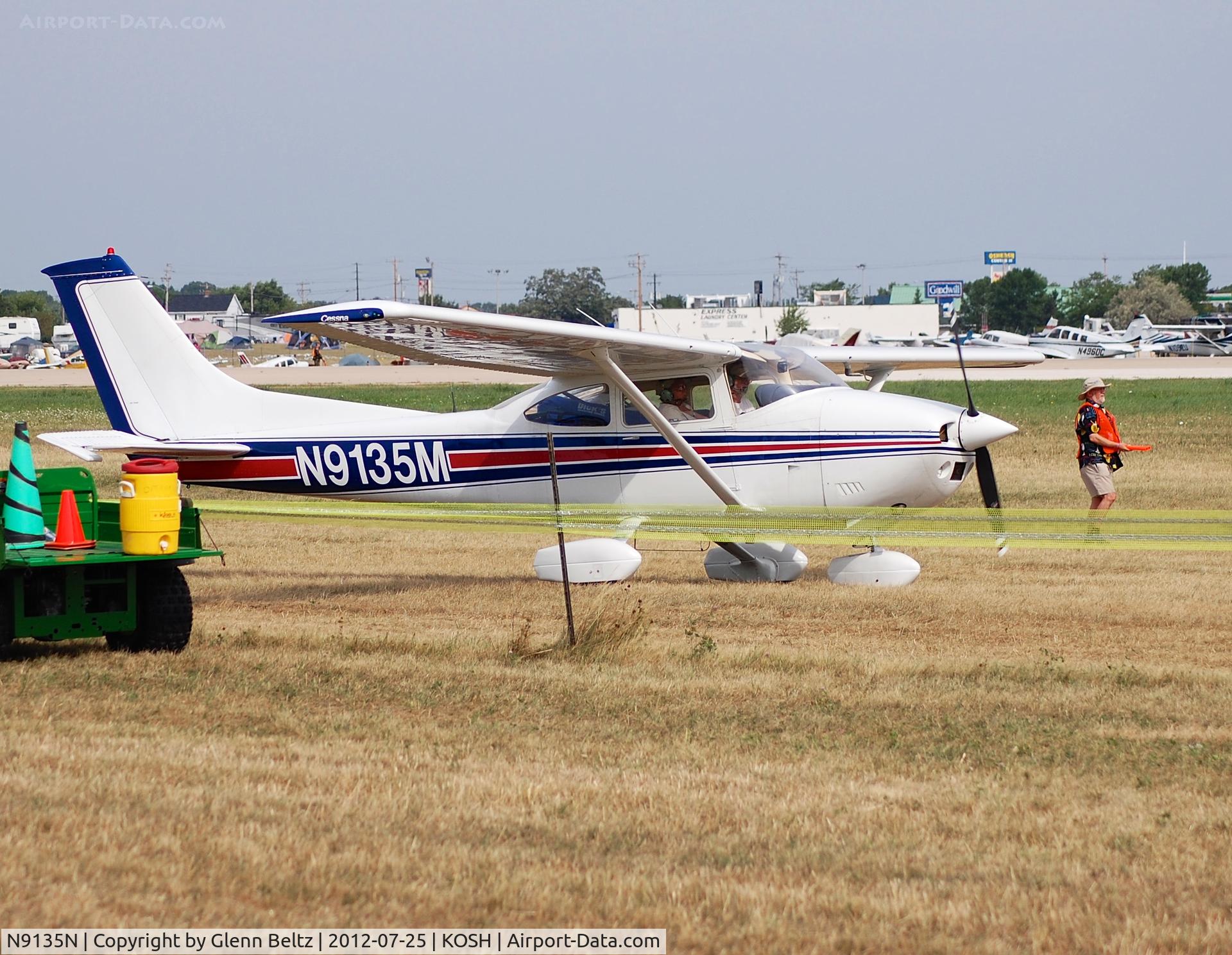N9135N, 1962 Aero Commander 500-B C/N 1269-92, Taxiing for departure at Oshkosh on 25 July 2012.
