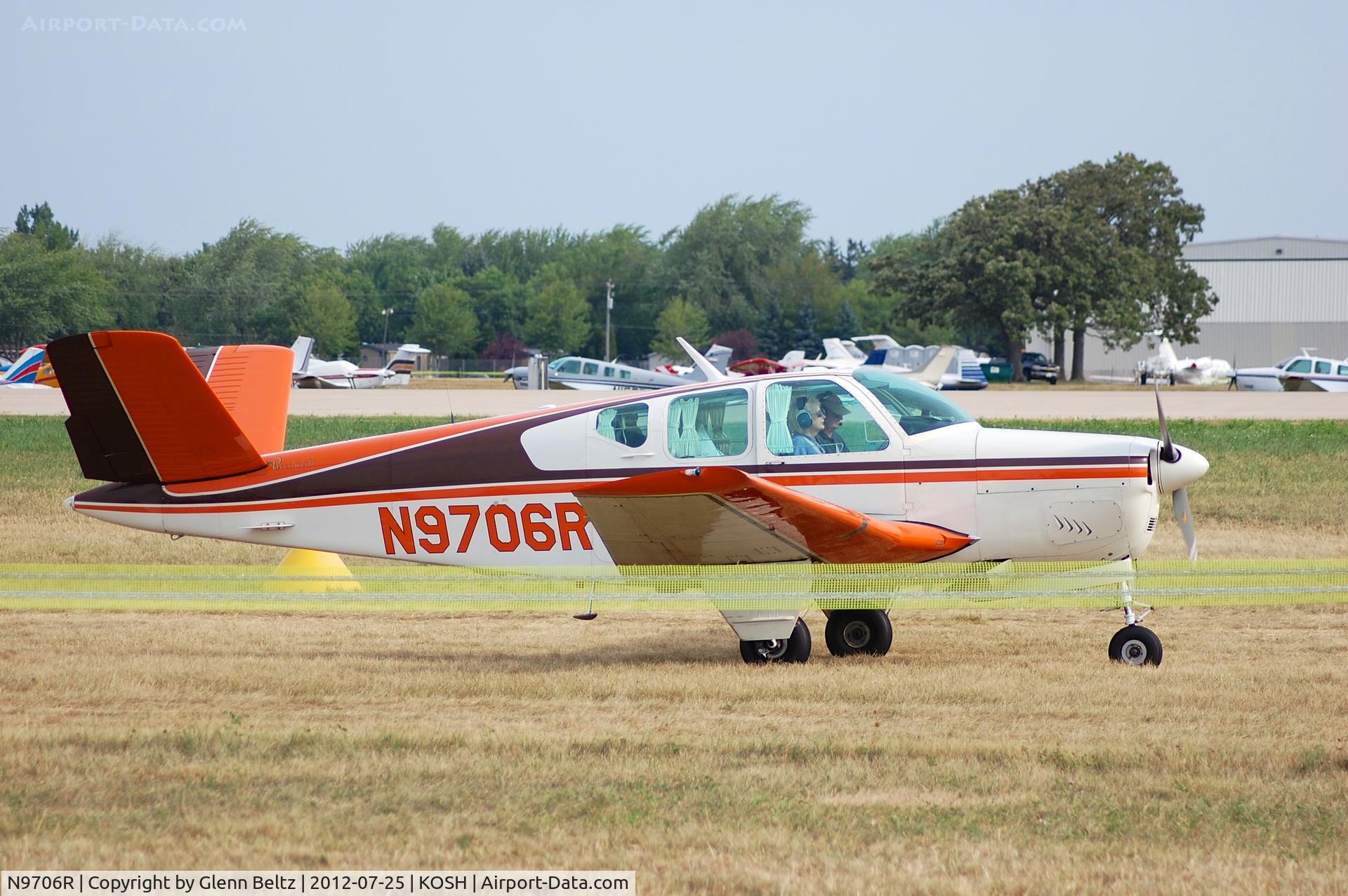 N9706R, 1959 Beech M35 Bonanza C/N D-6249, Taxiing for departure at Oshkosh on 25 July 2012.