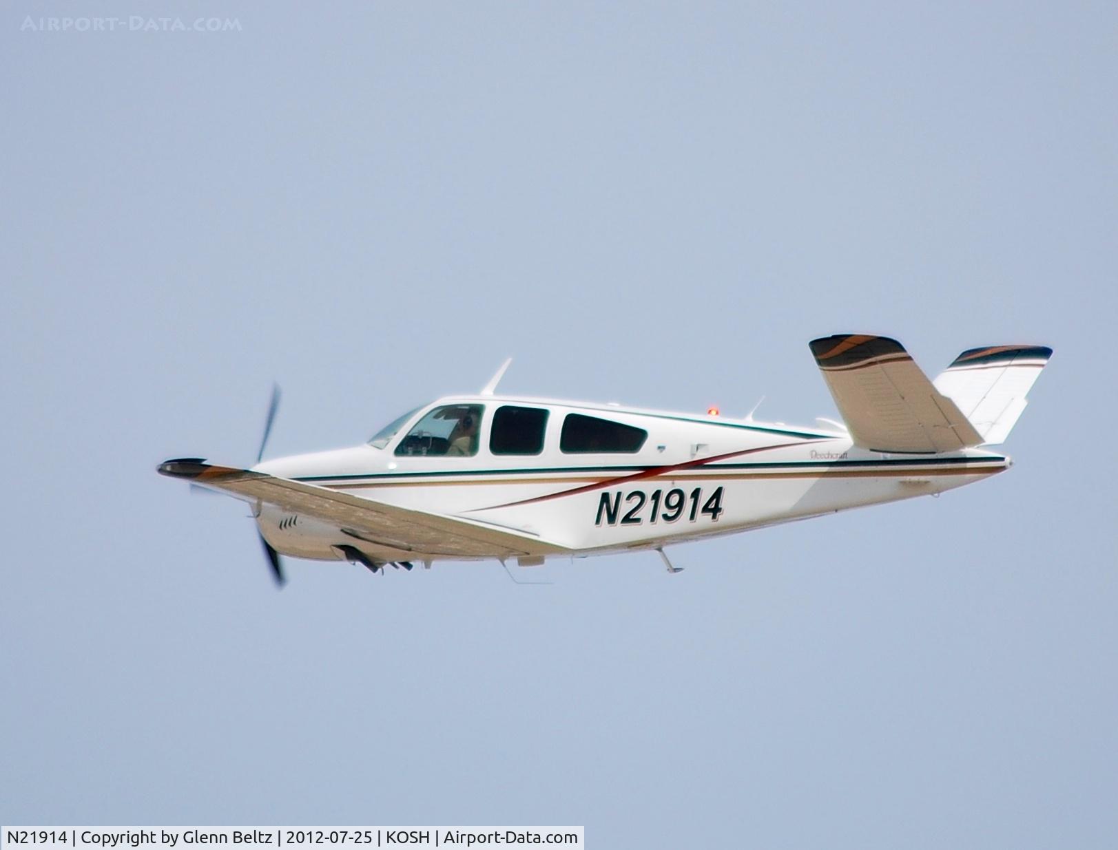 N21914, 1977 Beech V35B Bonanza C/N D-10078, Departing EAA Airventure/Oshkosh on 25 July 2012.