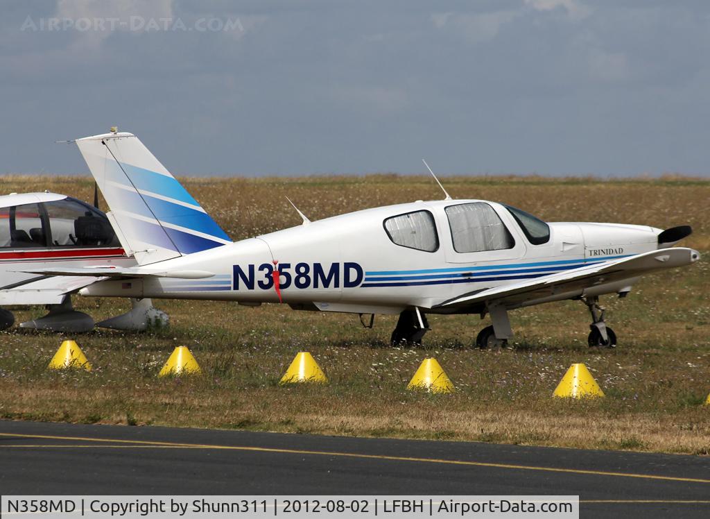 N358MD, Socata TB-20 Trinidad C/N 911, Parked in the grass...