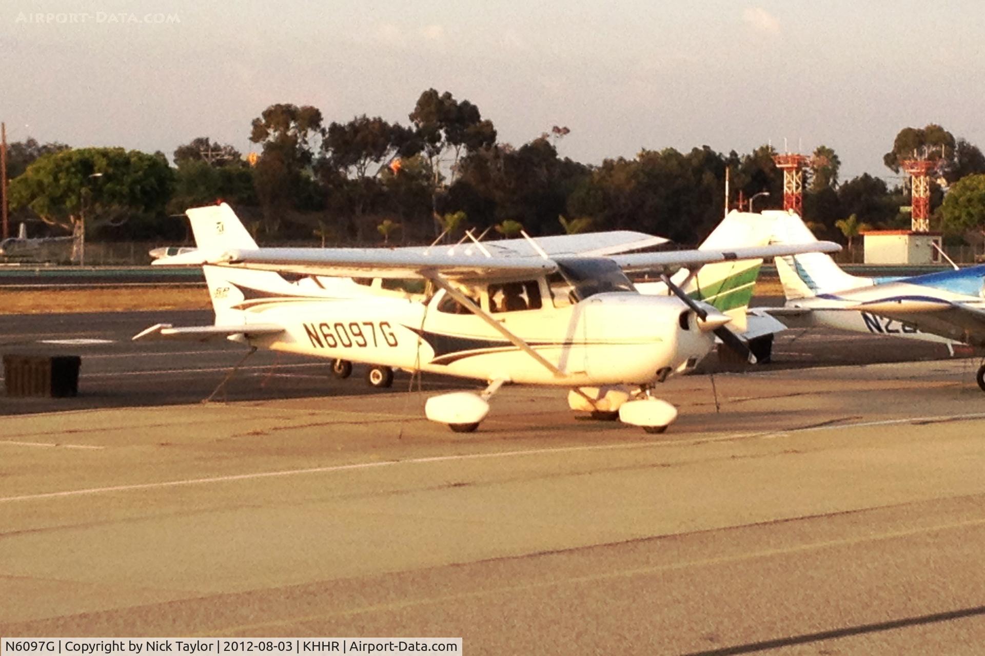 N6097G, 2004 Cessna 172S C/N 172S9673, Parked on the south side