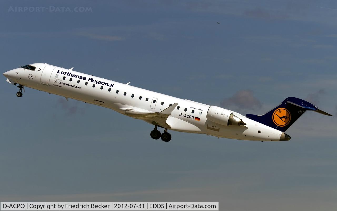 D-ACPO, 2003 Canadair CRJ-701ER (CL-600-2C10) Regional Jet C/N 10085, departure from Stuttgart