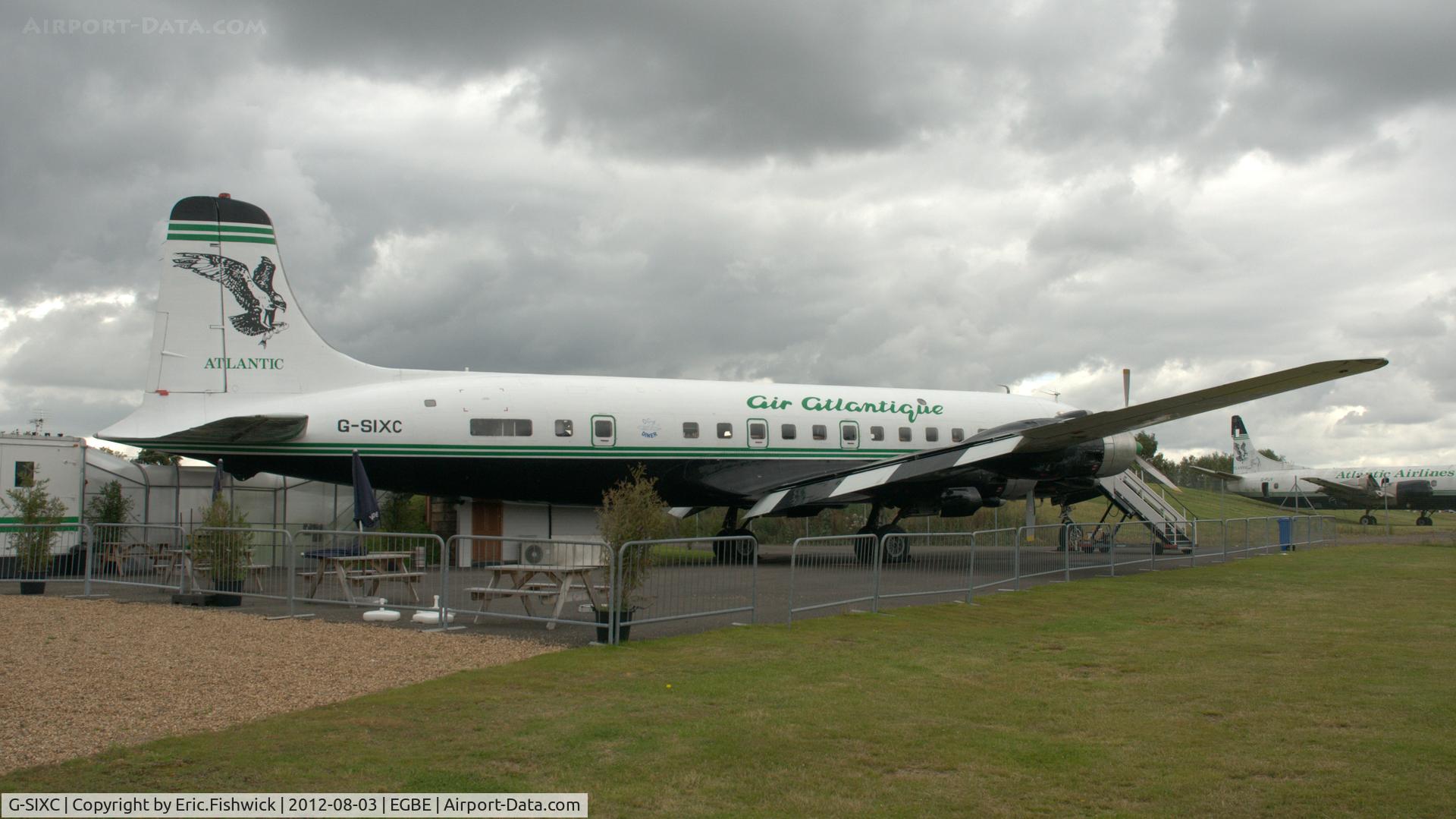 G-SIXC, 1958 Douglas DC-6B C/N 45550, 2. G-SIXC at Airbase, Coventry Airport West.