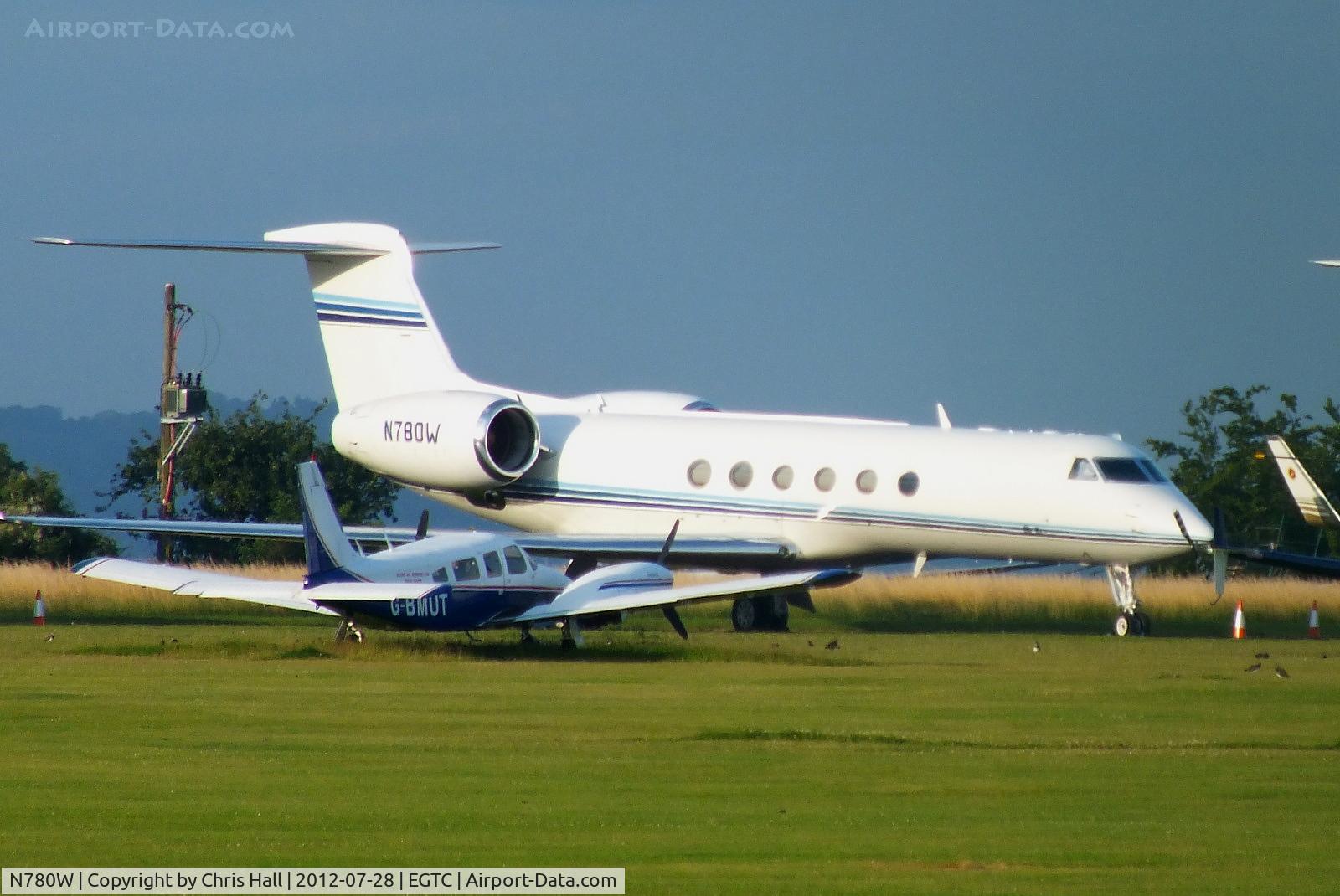 N780W, 1997 Gulfstream Aerospace G-V C/N 530, one of several bizjets parked at Cranfield with visitors for the opening of the London 2012 Olympic games