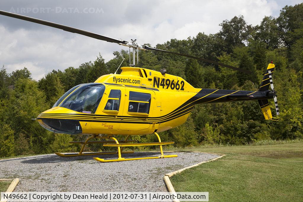 N49662, 1975 Bell 206B C/N 1871, Scenic Helicopter Tours 1975 Bell 206B Jet Ranger II N49662 parked on the pad in Sevierville, TN.
