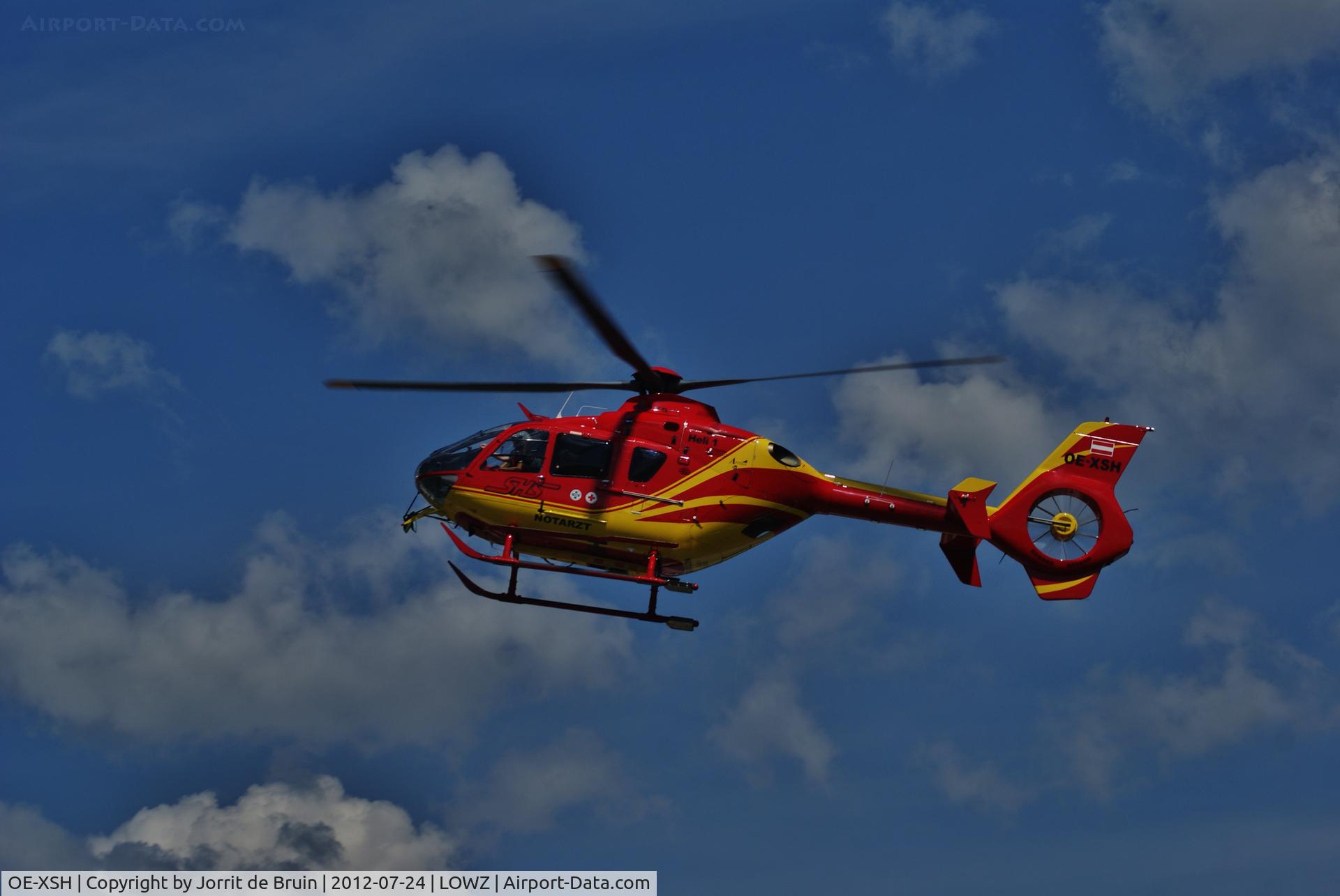OE-XSH, 1997 Eurocopter EC-135T-1 C/N 1092, The hangar is in sight. This beautiful but helpful Alpin Heli is hanging to the back, to brake. This is because he is back at his faithful homebase Zell am See after a successful mission.