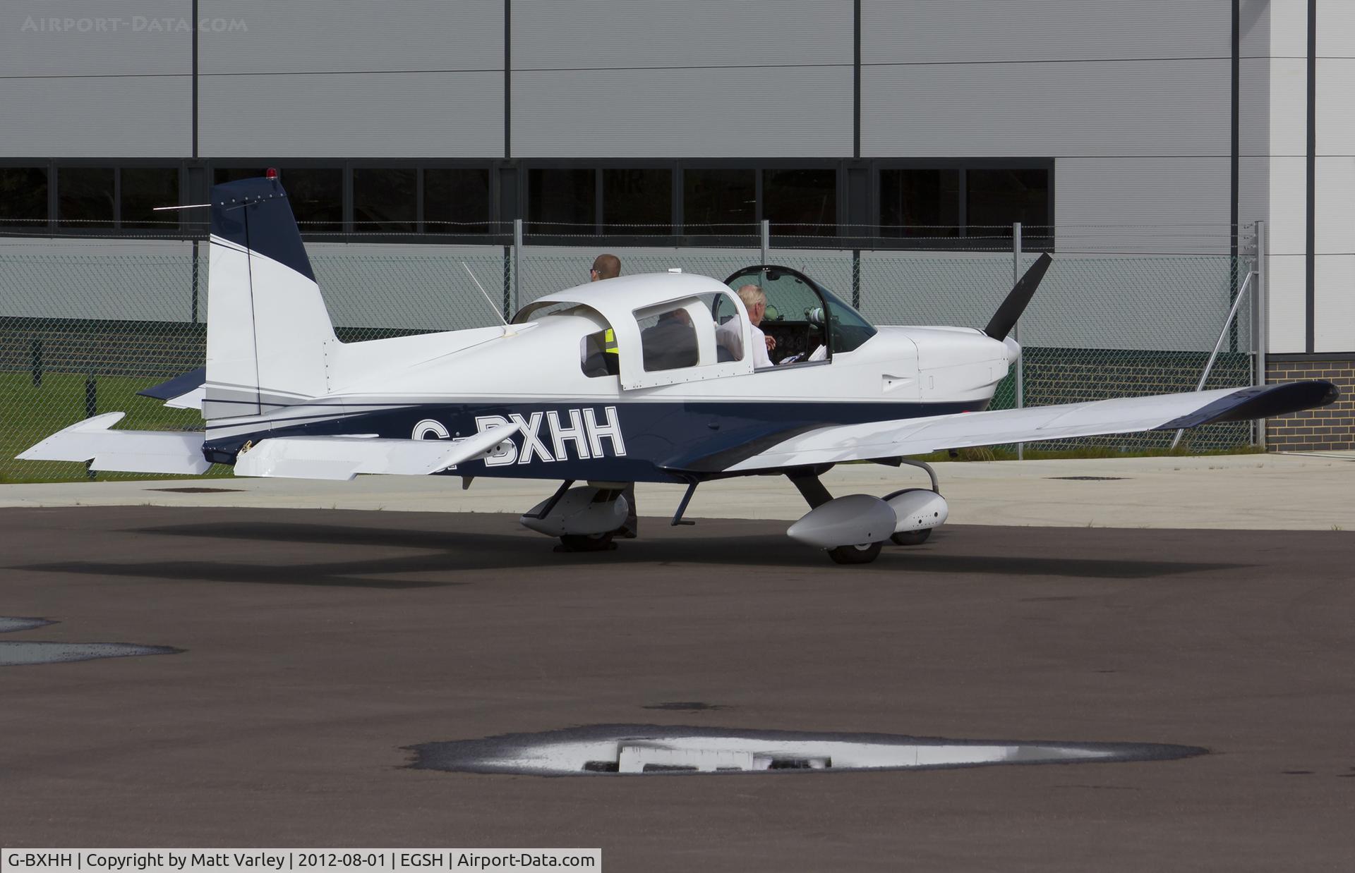 G-BXHH, 1976 Grumman American AA-5A Cheetah C/N AA5A-0105, Sat on stand at SaxonAir.