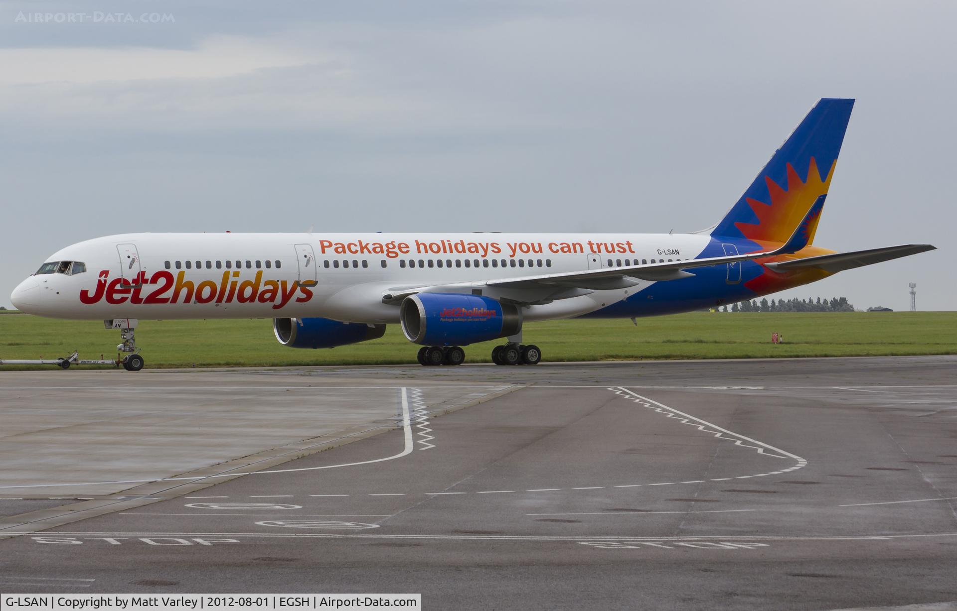 G-LSAN, 1994 Boeing 757-2K2 C/N 26635, Being towed to stand 7 after spray by Air Livery.