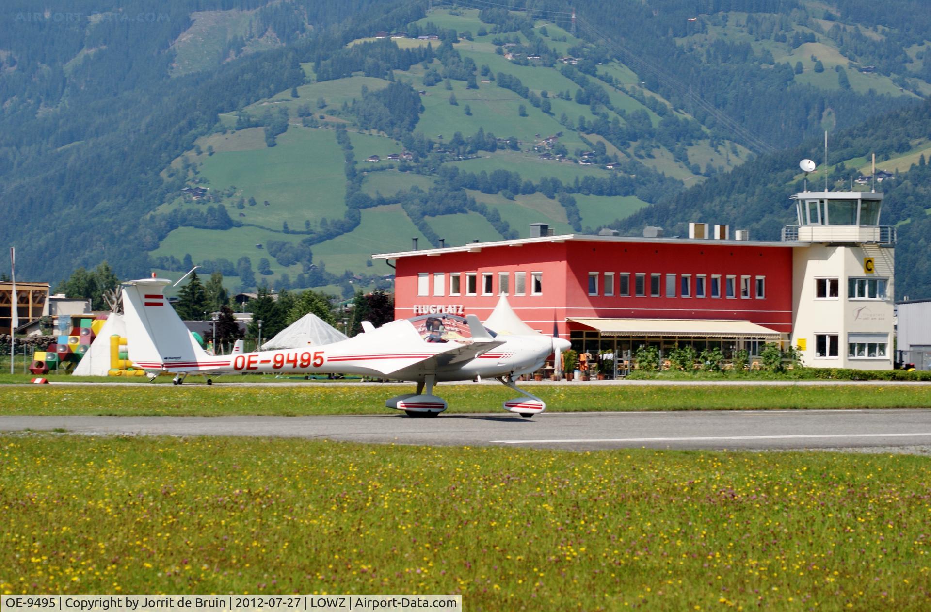 OE-9495, Diamond HK-36TTC Super Dimona C/N 36710, The pure red-white Austrian Diamond is high-speed lining up runway 08 at Zell am See Flugplatz, to depart quickly.