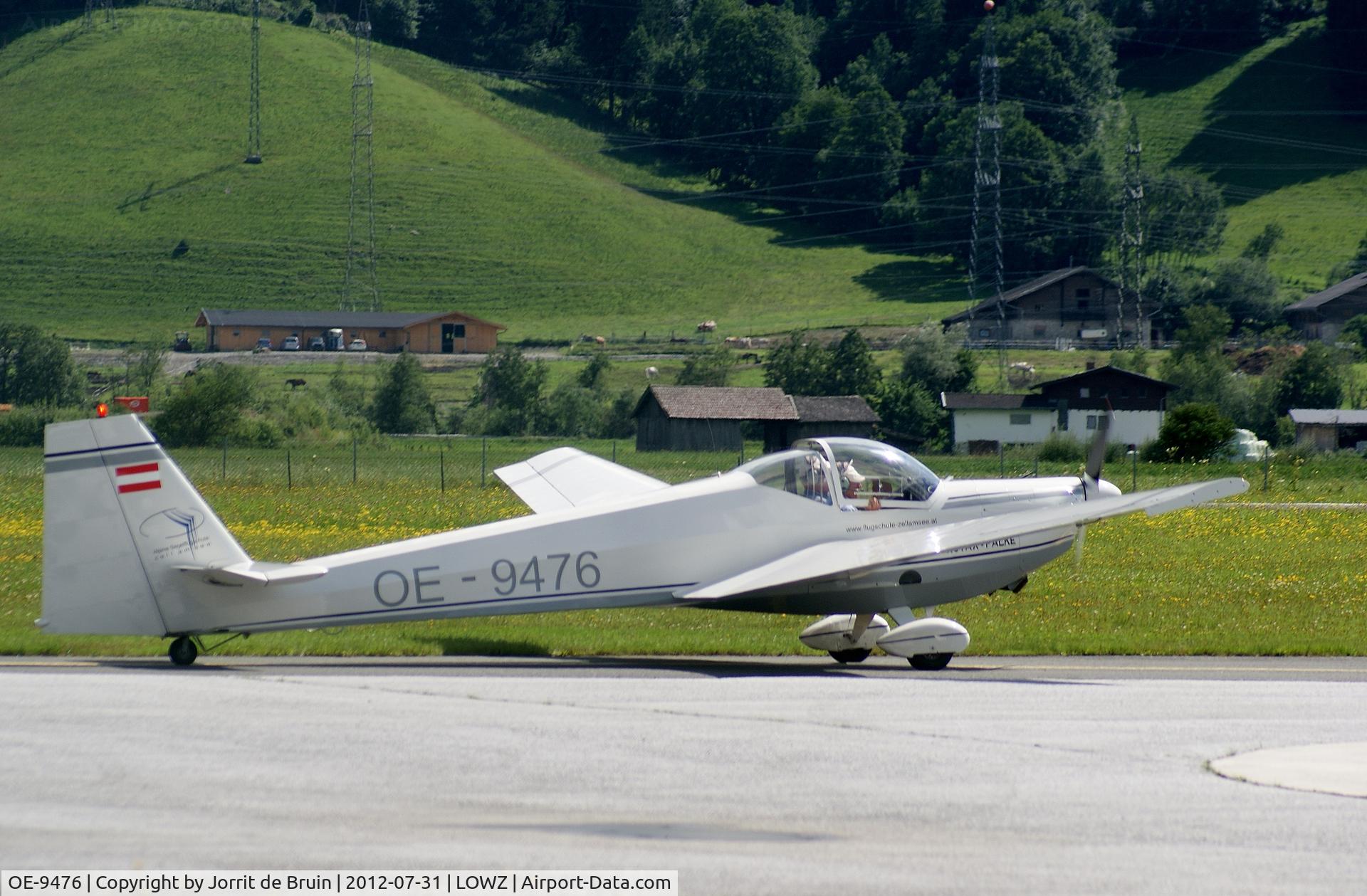 OE-9476, Scheibe SF-25C Falke C/N 44600, The motorglider of Zell am See doesn't have his roof closed, but that is also not necessary for such warm summer weather.