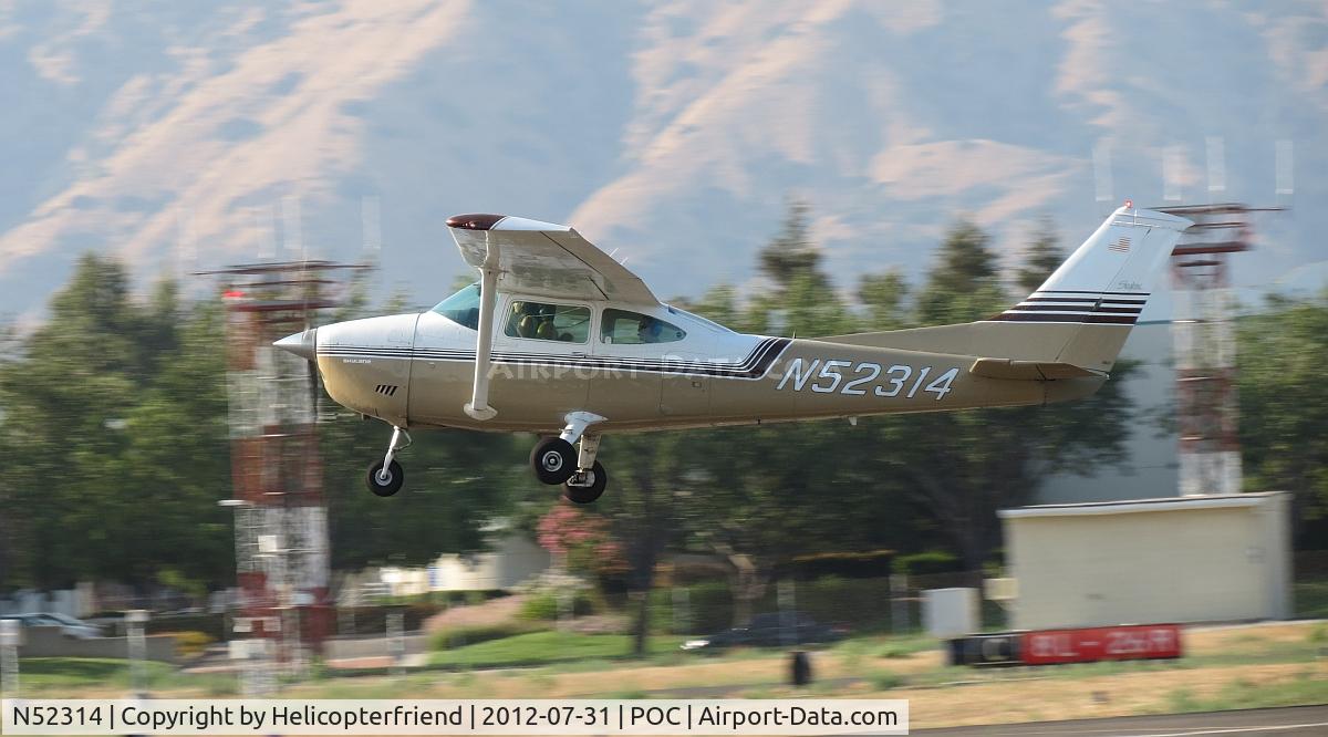 N52314, 1973 Cessna 182P Skylane C/N 18262521, Climbing out after take off on 26L
