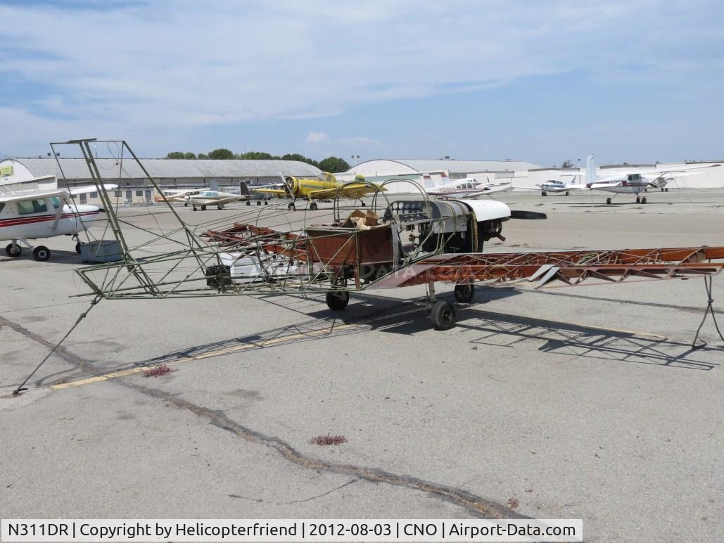 N311DR, 1959 Sportaire 2 C/N TT-1, Looks like she is being waiting to be covered