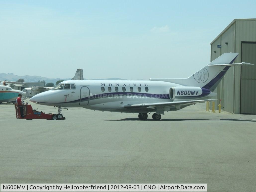 N600MV, 1993 British Aerospace BAe.125-1000A C/N 259036, Being towed to the center parking area