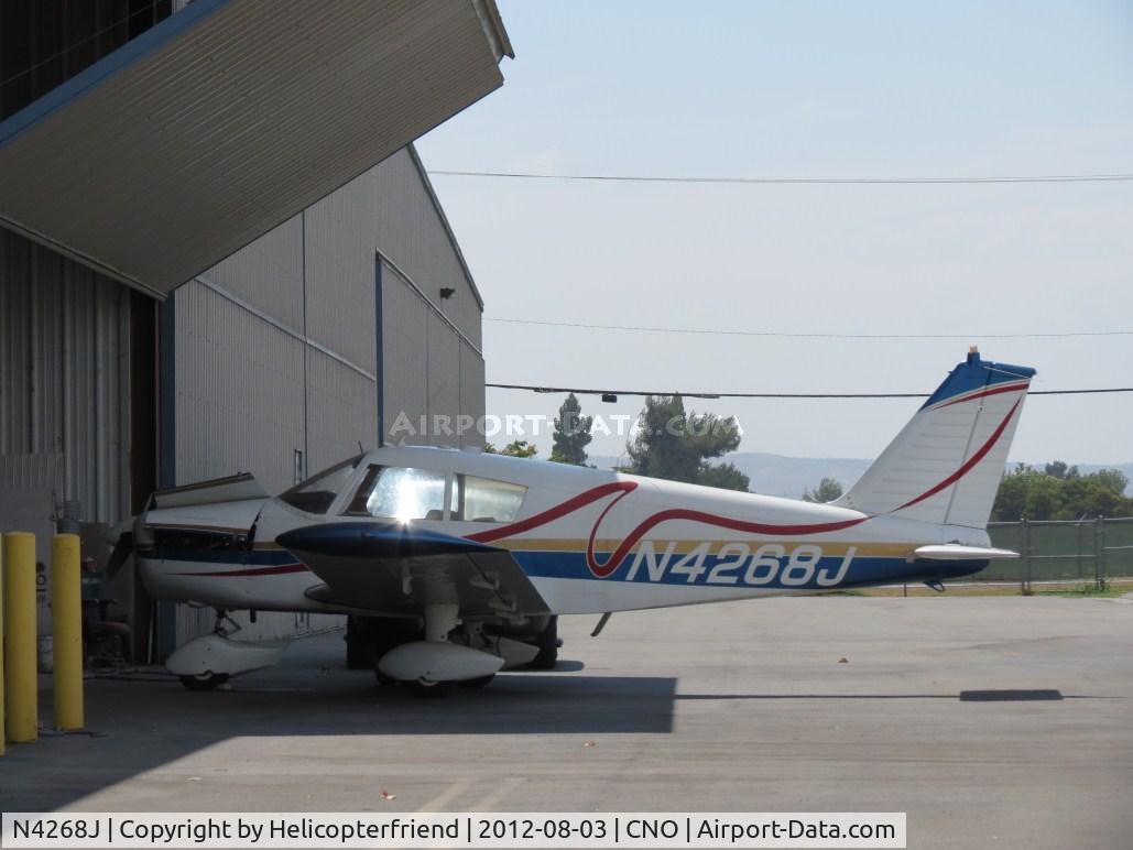 N4268J, 1967 Piper PA-28-140 C/N 28-22626, Parked in the shade and being worked on