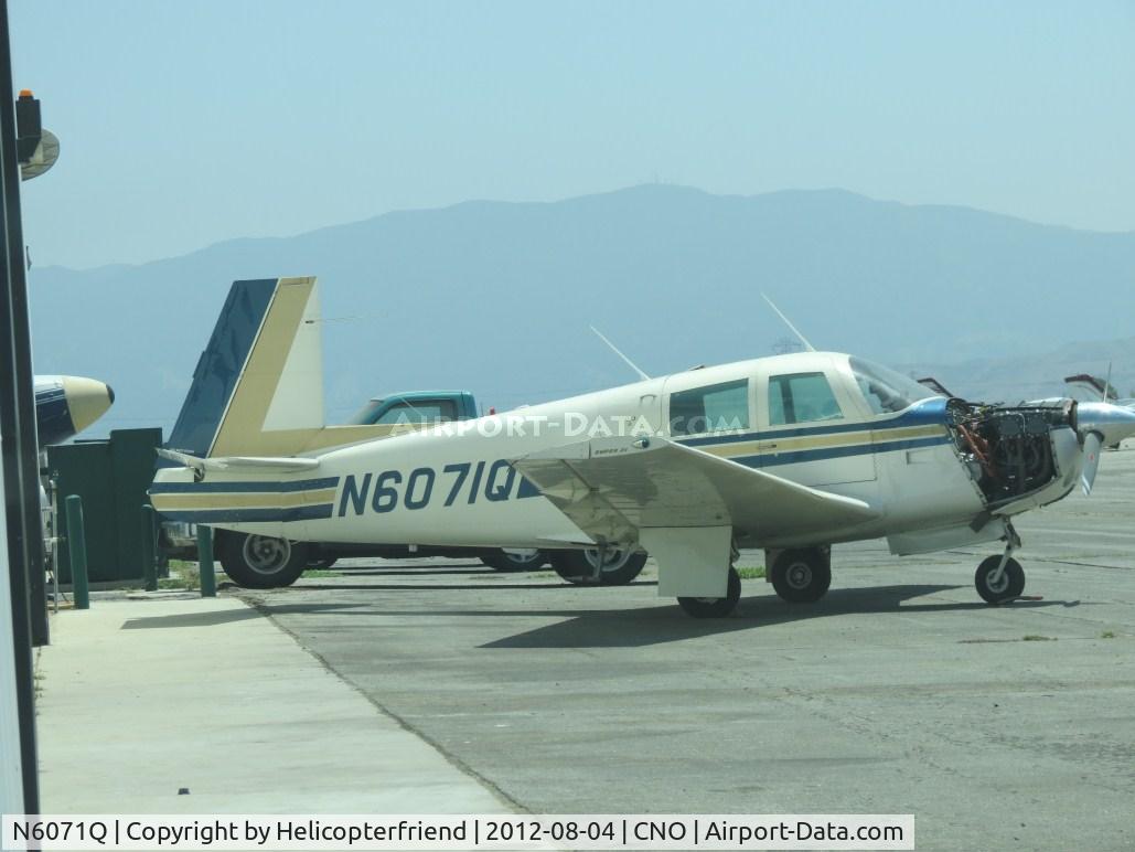 N6071Q, 1965 Mooney M20E C/N 900, Backed up to the hanger and having engine worked on