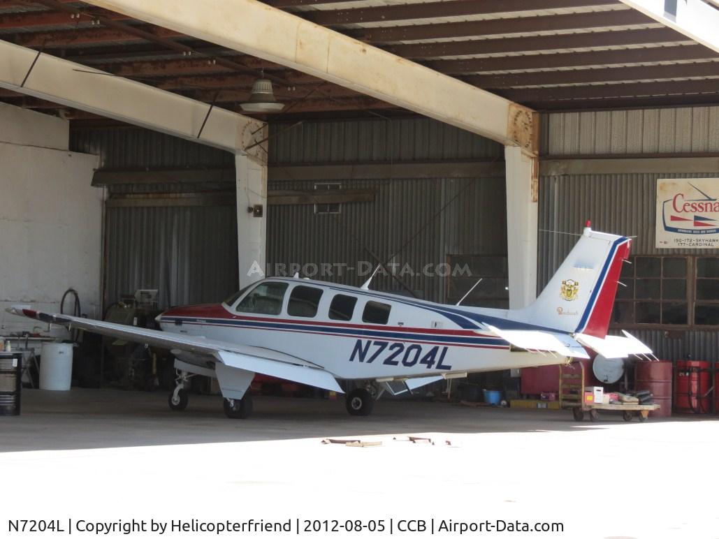 N7204L, 1984 Beech B36TC Bonanza C/N EA-431, Parked in Foothill Aircraft Sales & Service work bay