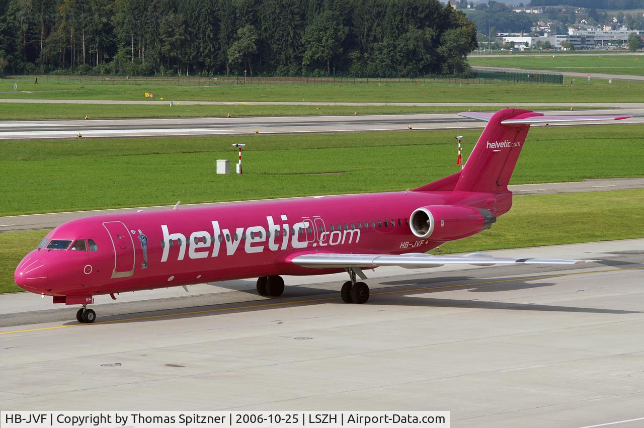HB-JVF, 1993 Fokker 100 (F-28-0100) C/N 11466, Helvetic's HB-JVF in old Helvetic c/s passes Dock B after Arrival at ZRH.