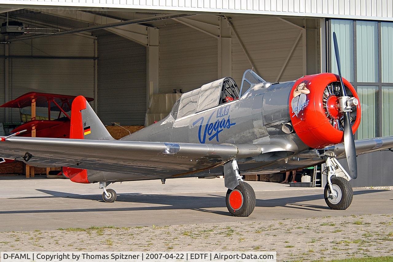 D-FAML, North American AT-6D Harvard III C/N 88-17026, Miss Las Vegas infront of her hangar at QFB airfield. Note the Fokker Triplane in the background.