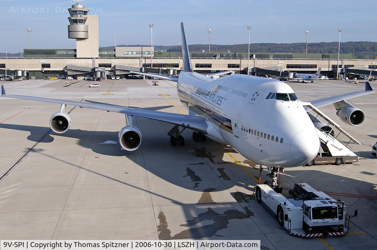 9V-SPI, 1996 Boeing 747-412 C/N 28022, Singapore Airlines 9V-SPI sitting at Dock B awaiting
pushback for it's flight to Singapore. Wide angle lens shot.