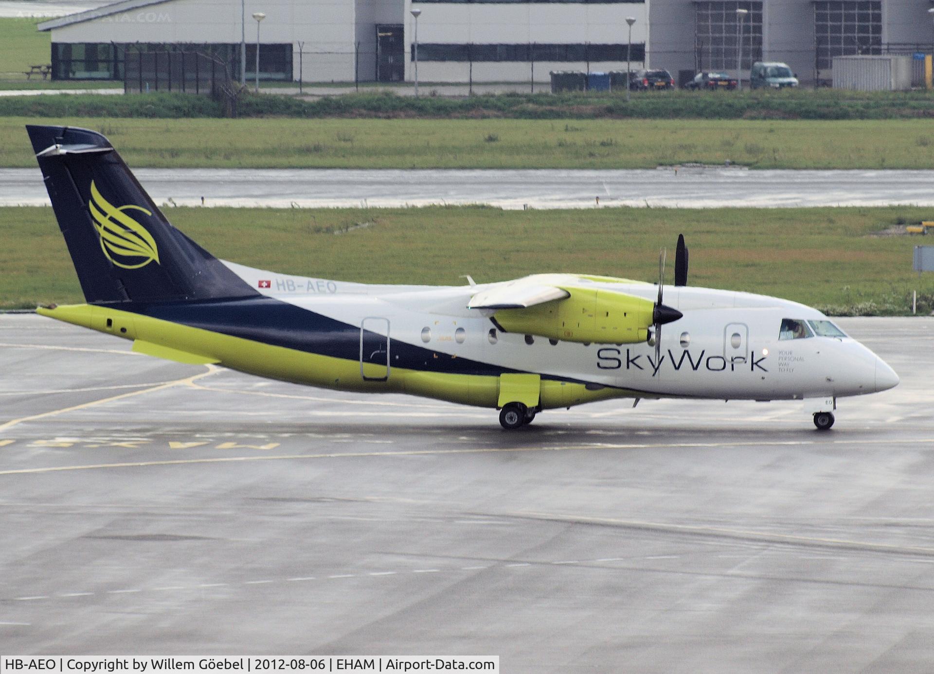 HB-AEO, 1995 Dornier 328-100 C/N 3061, Taxi to the gate of Schiphol Airport