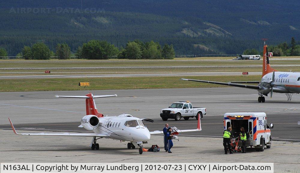 N163AL, Learjet Inc 31A C/N 053, On the ramp at Whitehorse, Yukon on a medevac mission.