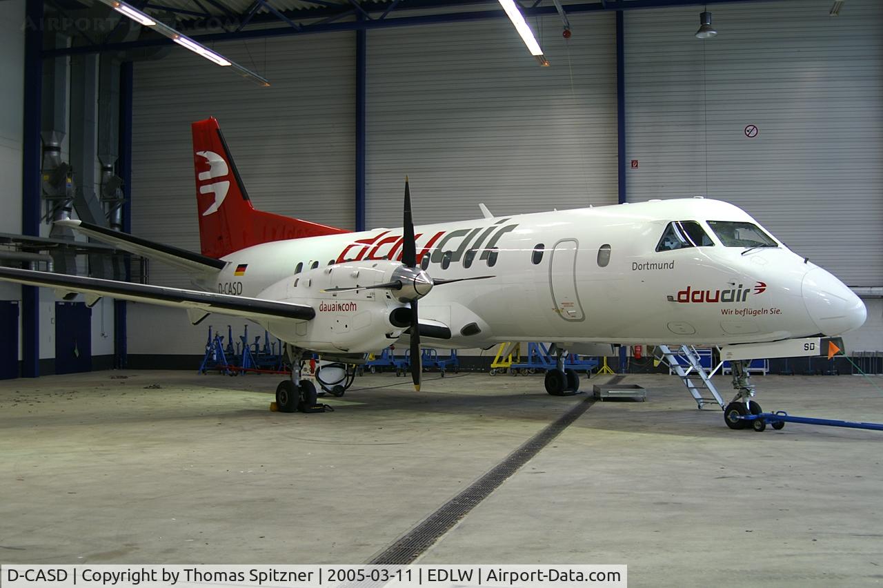 D-CASD, 1990 Saab 340B C/N 340B-221, Dauair D-CASD parked in it's hangar at DTM. Aircraft is named 