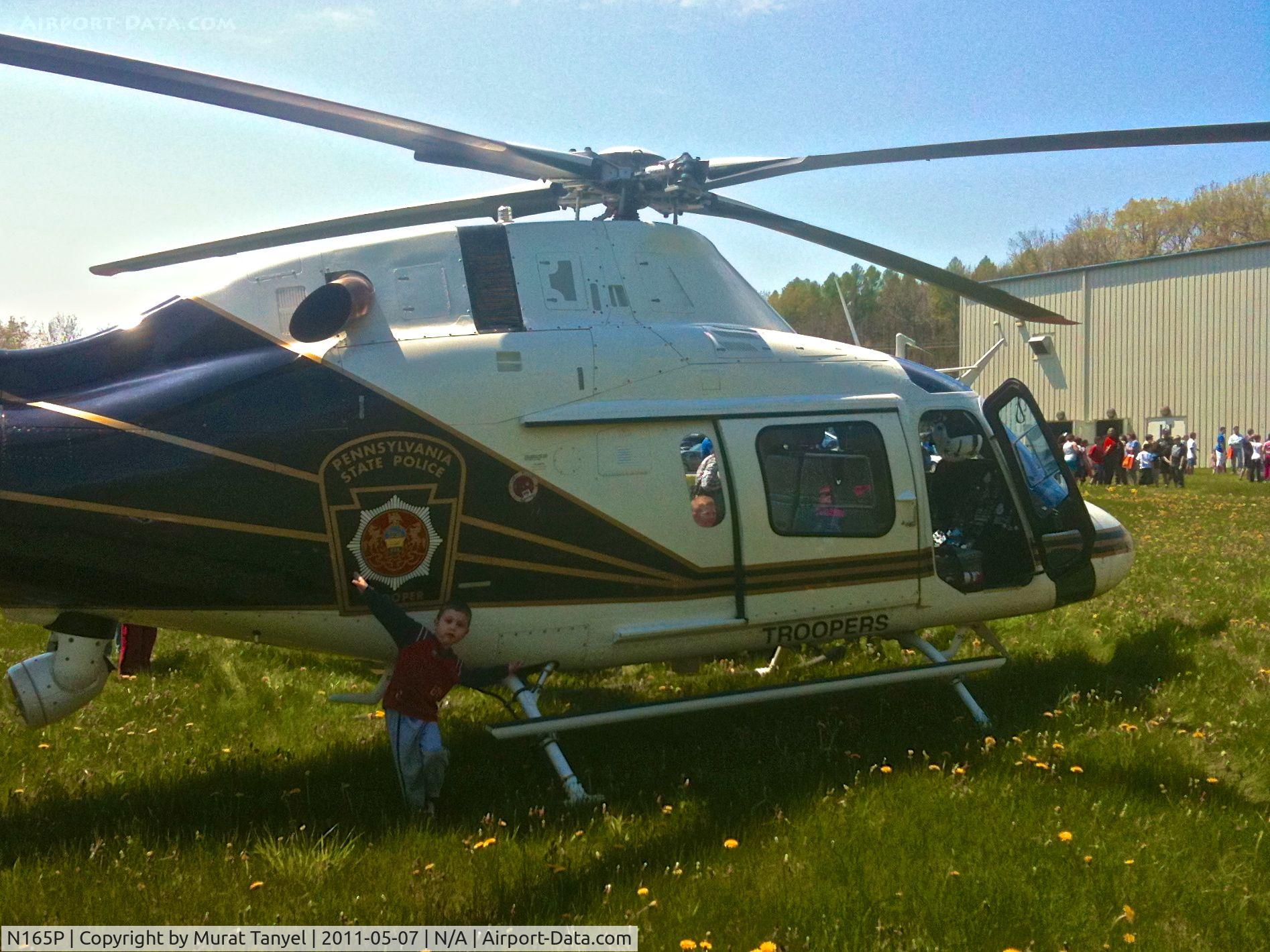 N165P, 2003 Agusta A-119 C/N 14030, My younger son posing with the aircraft at Show-and-Tell behind the Y-Zone in Neshannock, New Castle, PA