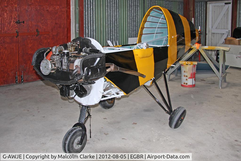 G-AWJE, 1968 Tipsy T-66 Nipper Mk 3 C/N S121, Slingsby T.66 Nipper 3 undergoing some TLC at The Real Aeroplane Company's Summer Madness Fly-In, Breighton Airfield, August 2012.