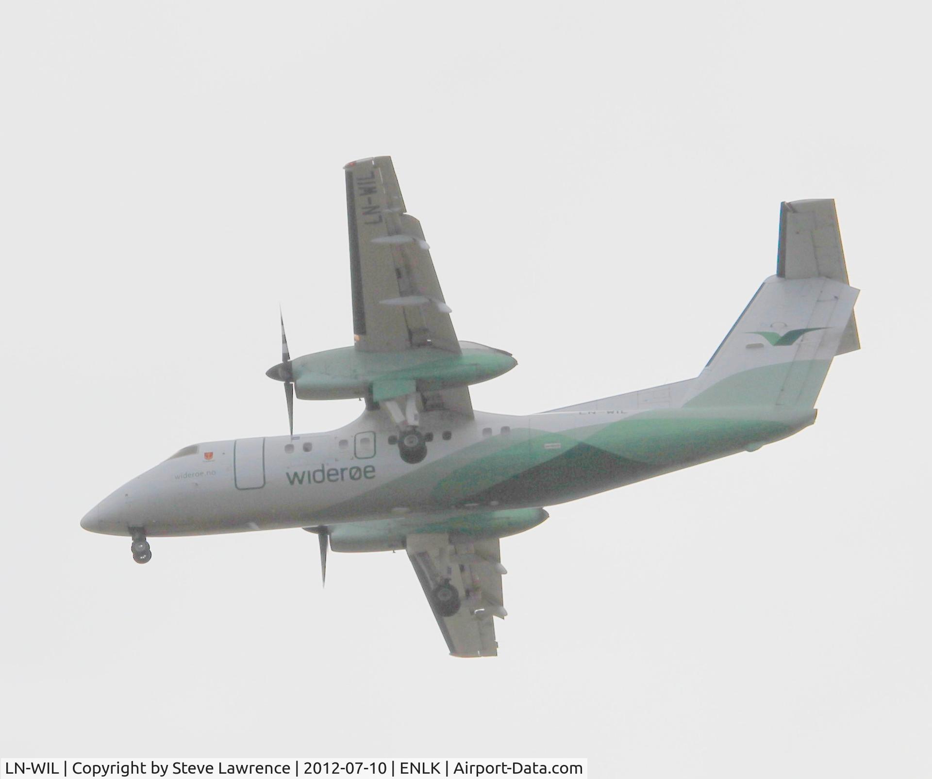 LN-WIL, 1995 De Havilland Canada DHC-8-103B Dash 8 C/N 398, Flying over Gravdal, Lofoten Islands