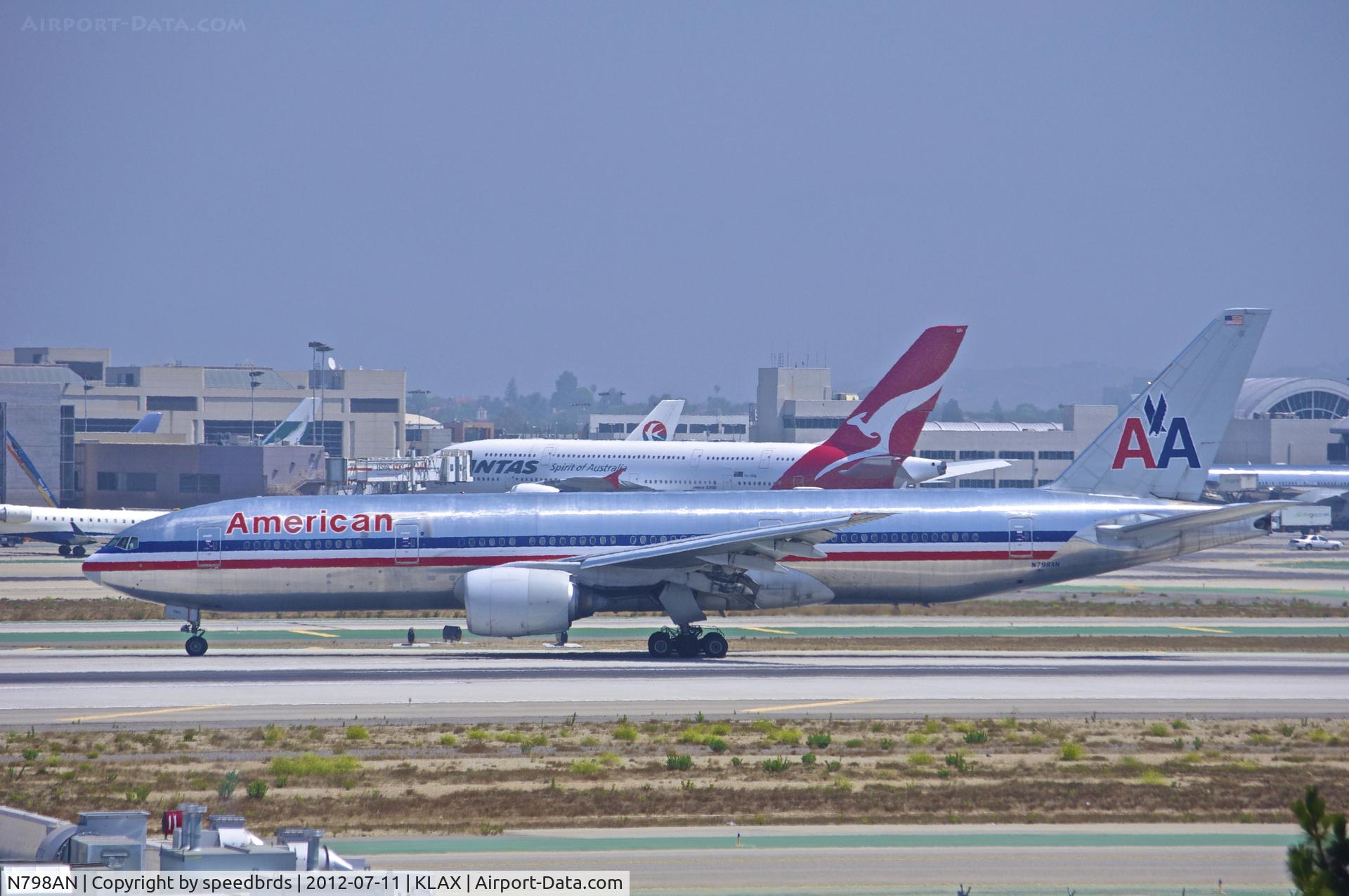 N798AN, 2001 Boeing 777-223 C/N 30797, American Airlines Triple Seven exiting Rwy 25L onto high speed taxiway 