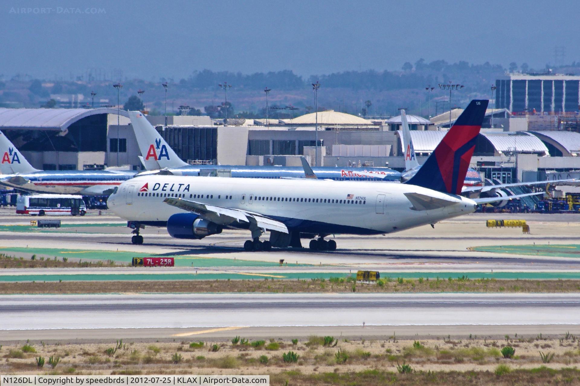 N126DL, 1988 Boeing 767-332 C/N 24076, Delta Airlines 767-300 minutes after performing an emergency landing do to landing gear issues.  Gear doors inoperable.  Flight originated from San Diego to Atlanta.