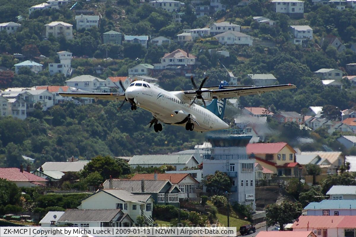 ZK-MCP, 2000 ATR 72-212A C/N 630, Good view on the control tower, built in the residential area adjacent to the airport due to a lack of space on aiport grounds...