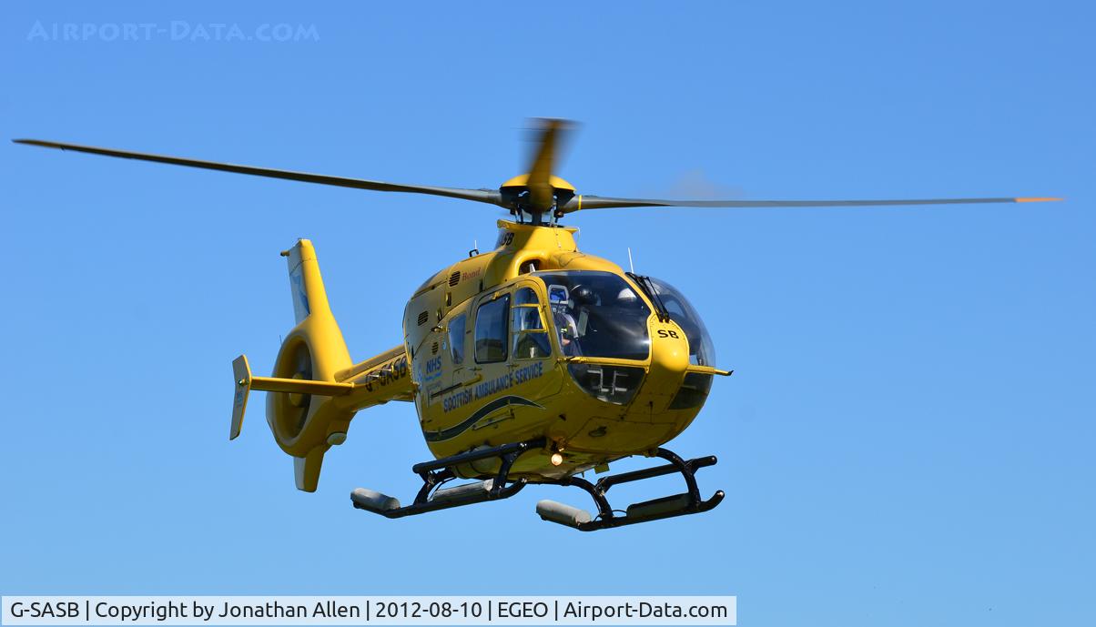G-SASB, 2000 Eurocopter EC-135T-2+ C/N 0151, Lifting-off from Oban heading for Barra.