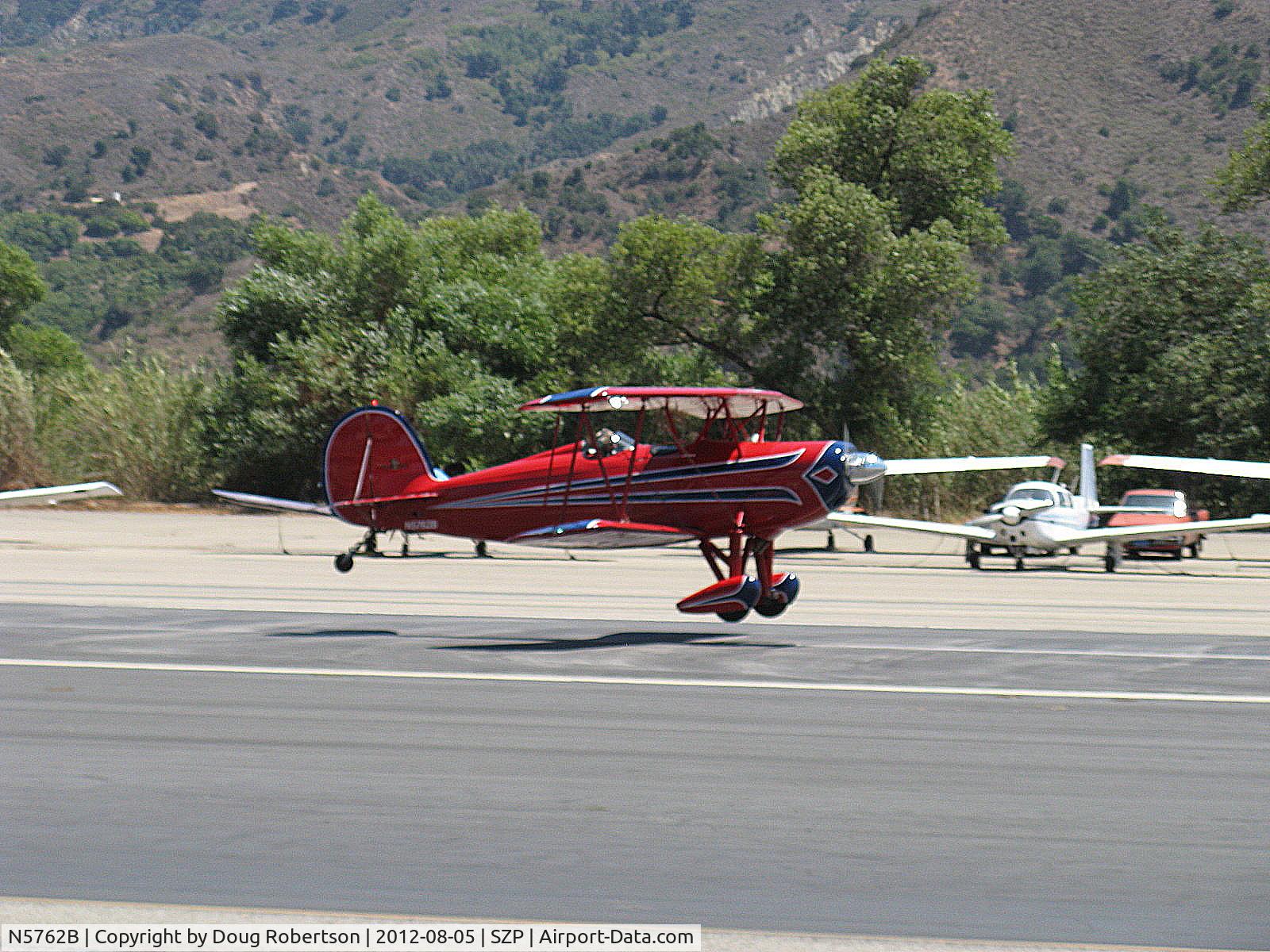 N5762B, 1980 Great Lakes 2T-1A-2 Sport Trainer C/N 0833, 1980 Great Lakes 2T-1A-2 SPORT TRAINER, Lycoming AEIO-360-B1FG 180 Hp inverted systems fully aerobatic, takeoff Rwy 22 in a bit of a blur