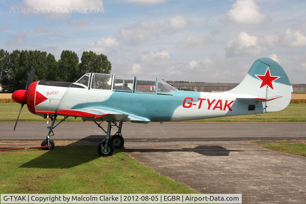 G-TYAK, 1989 Bacau Yak-52, c/n 899907, Bacau Yak-52 at The Real Aeroplane Club's Summer Madness Fly-In, Breighton Airfield, August 2012.