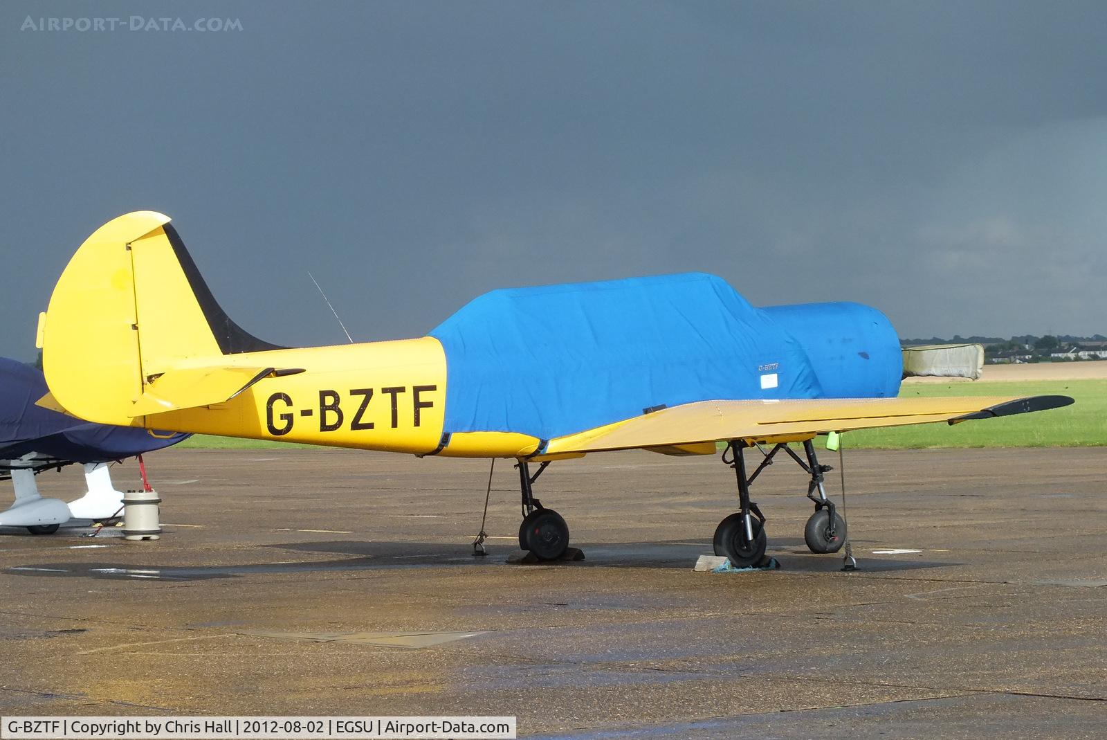 G-BZTF, 1986 Bacau Yak-52 C/N 866703, on the apron at Duxford