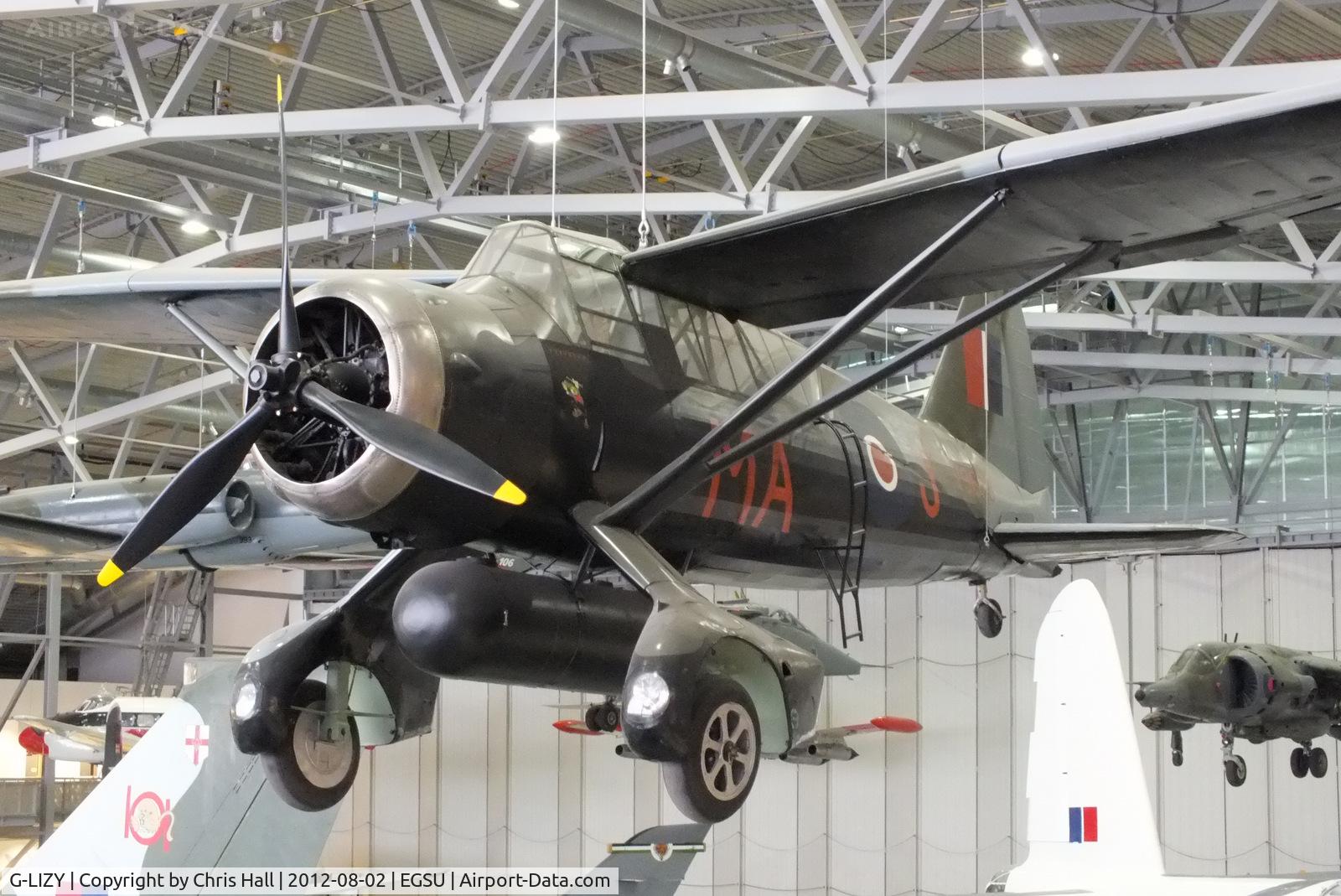G-LIZY, 1940 Westland Lysander IIIA C/N 504/39, displayed inside the AirSpace hangar, Duxford