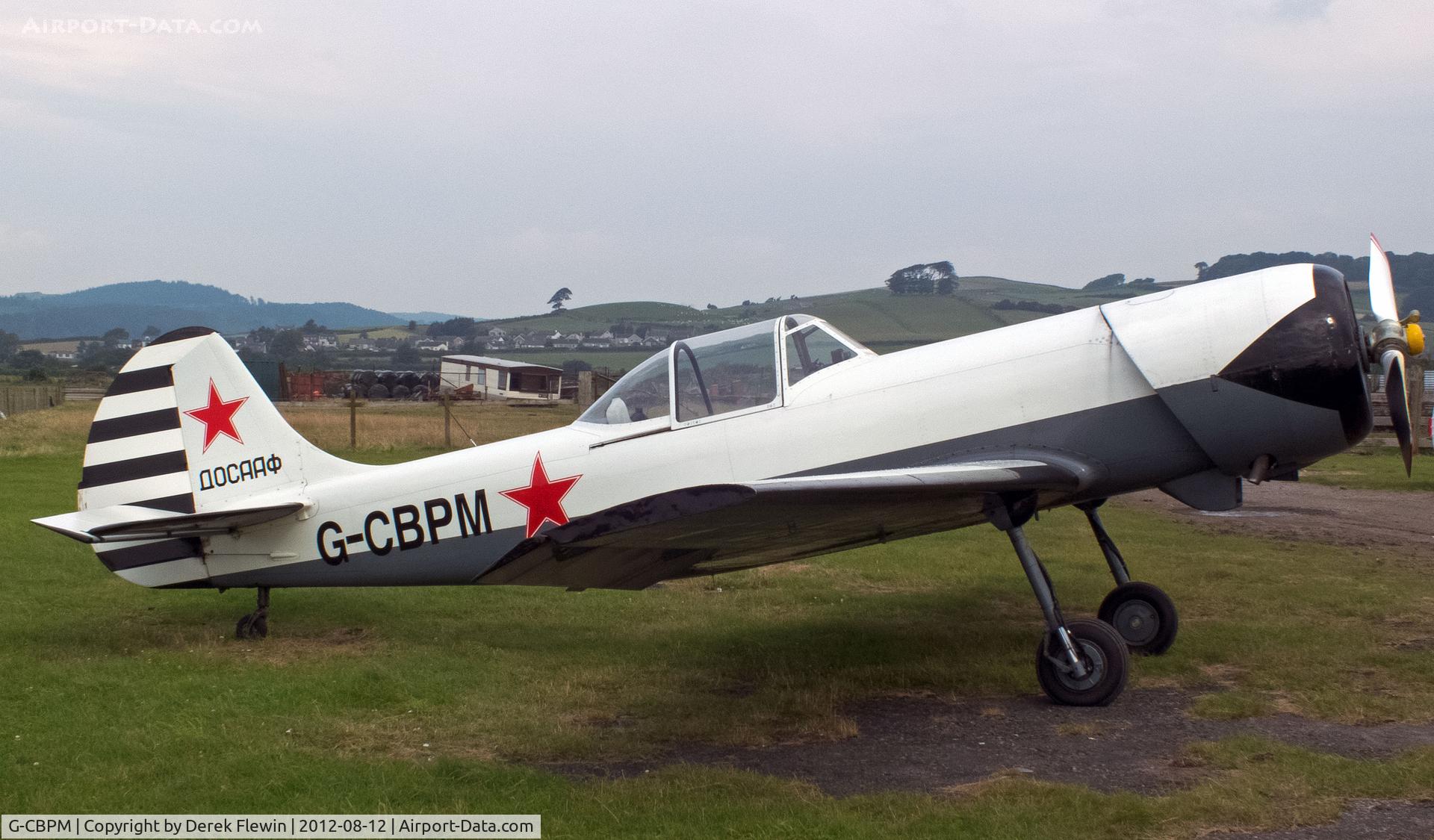 G-CBPM, 1981 Yakovlev Yak-50 C/N 812101, Seen at Cark Airfield, Cumbria, overnighting before another display.